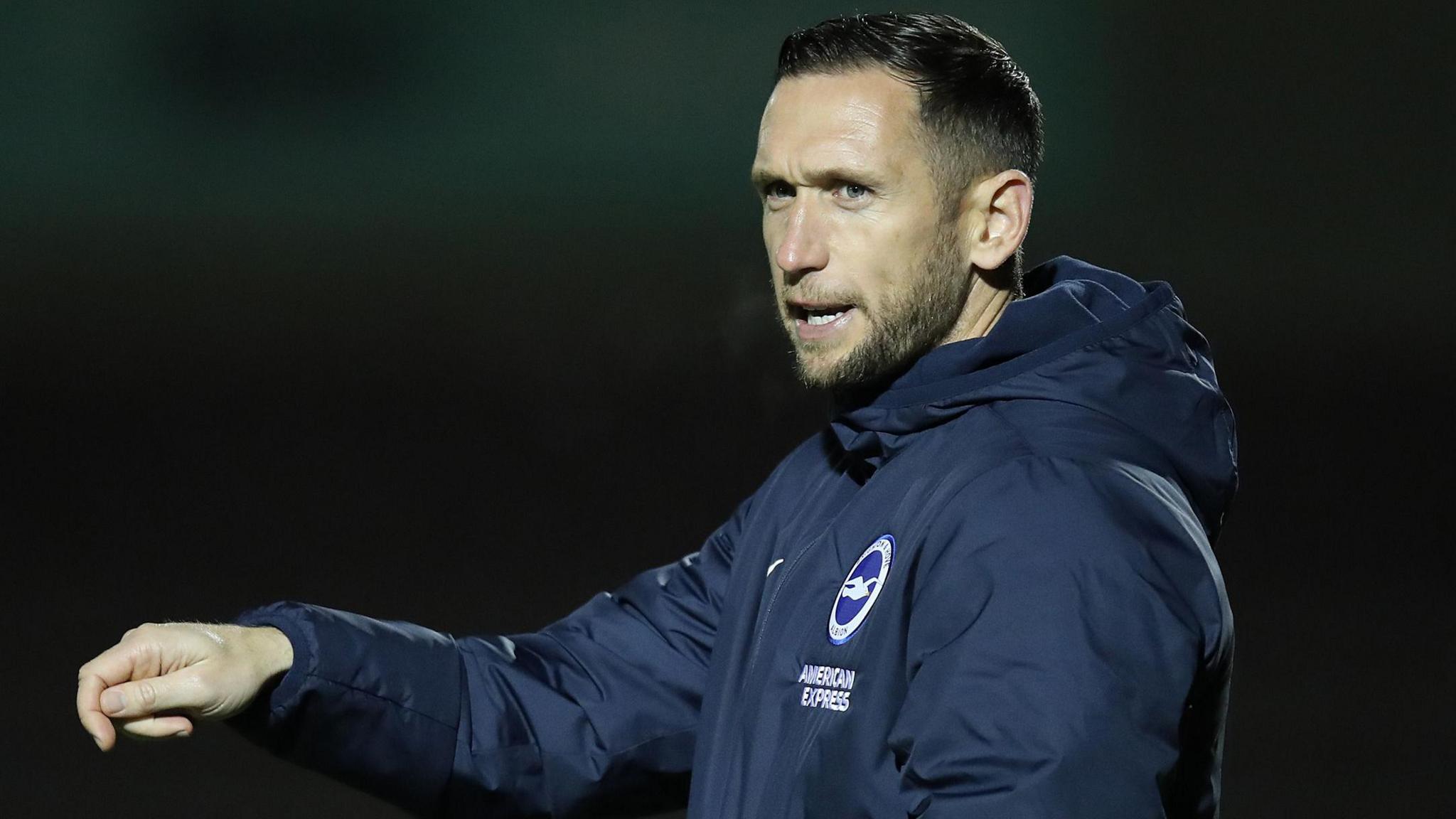 Andrew Crofts on coaching duty in a Brighton and Hove Albion coat