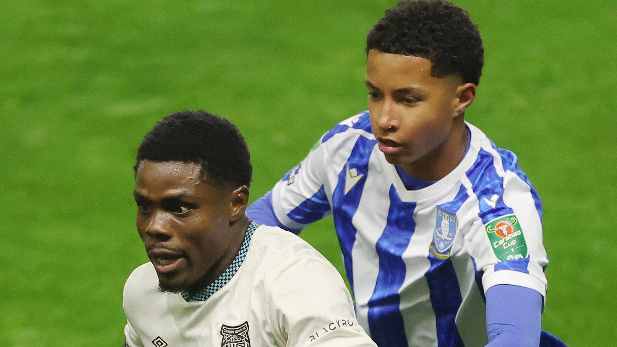 Yisa Alao (right) in action for Sheffield Wednesday against Grimsby Town