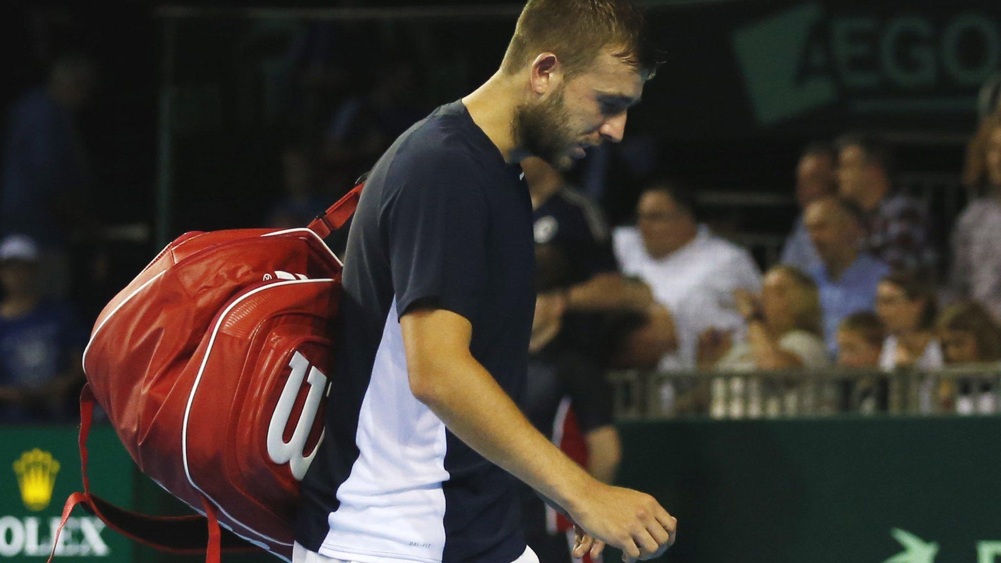 Dan Evans looks dejected