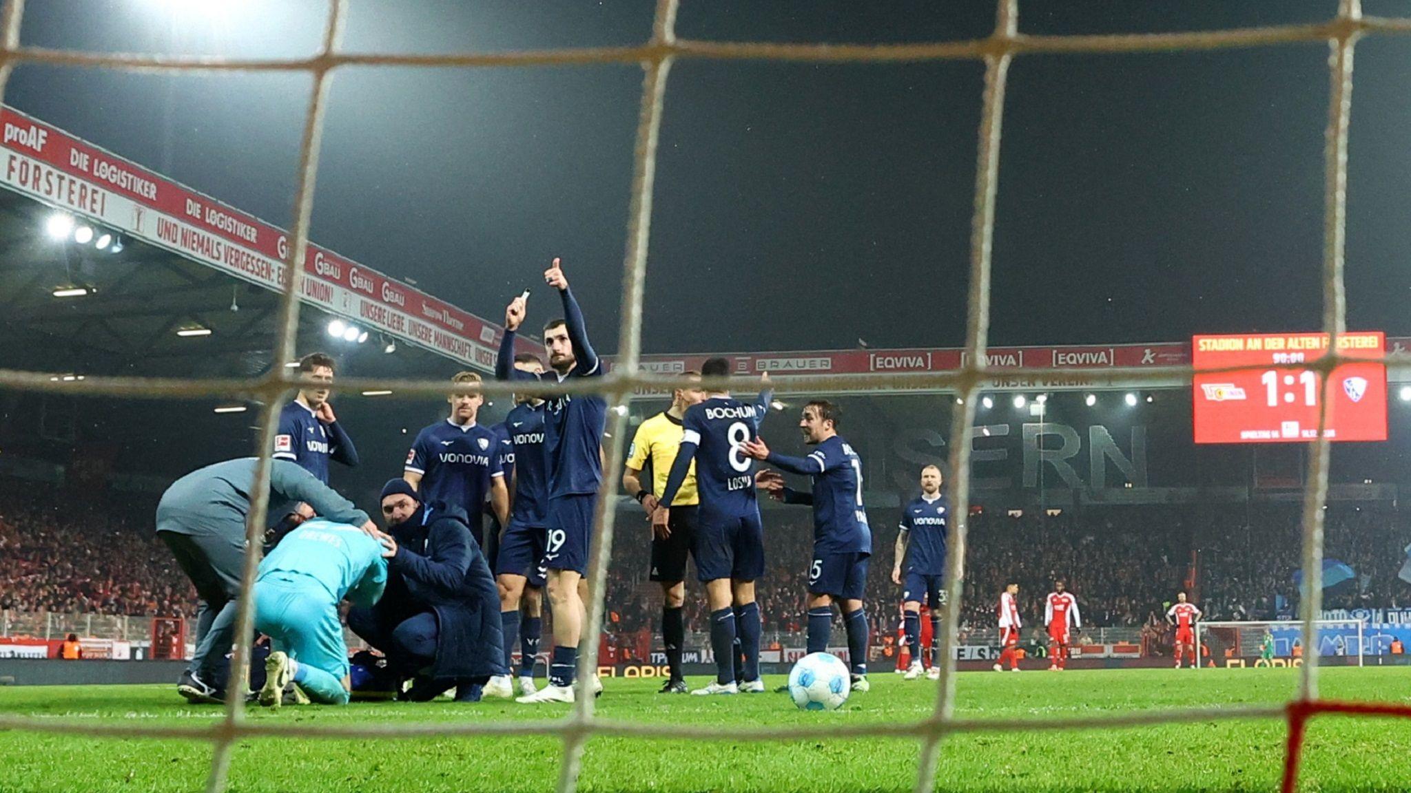 Drewes receives medical attention on the pitch at Union Berlin