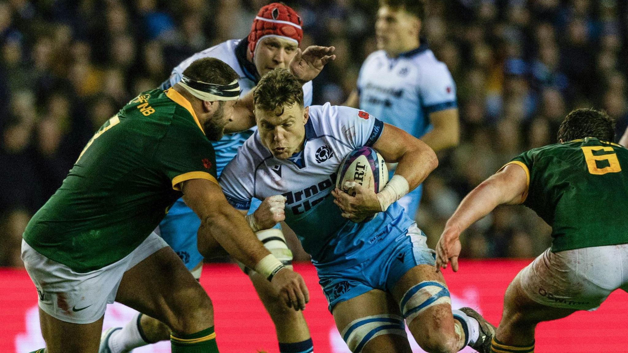 Scotland's Jack Dempsey (centre) in action against South Africa