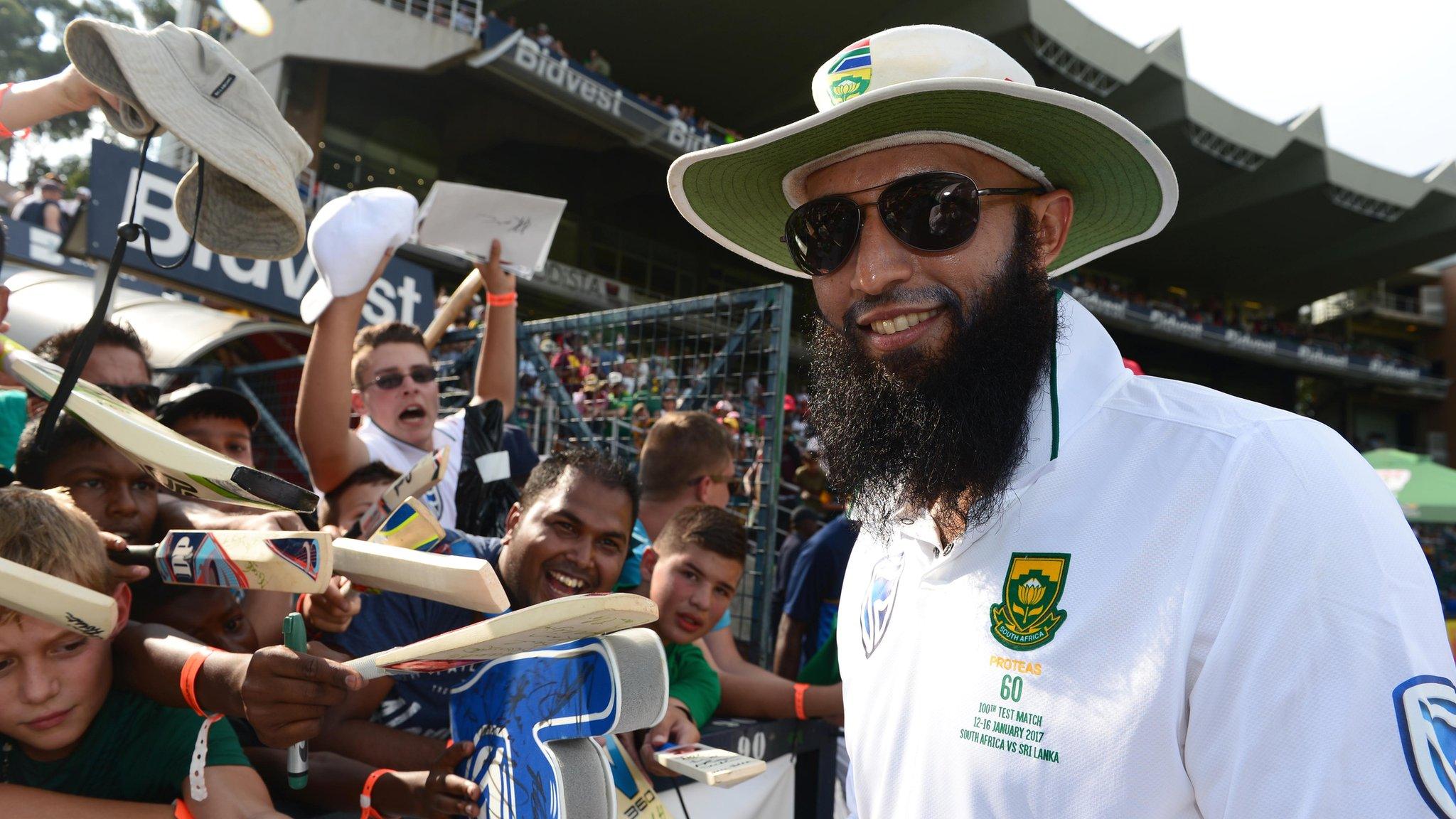 South Africa's Hashim Amla celebrates with supporters