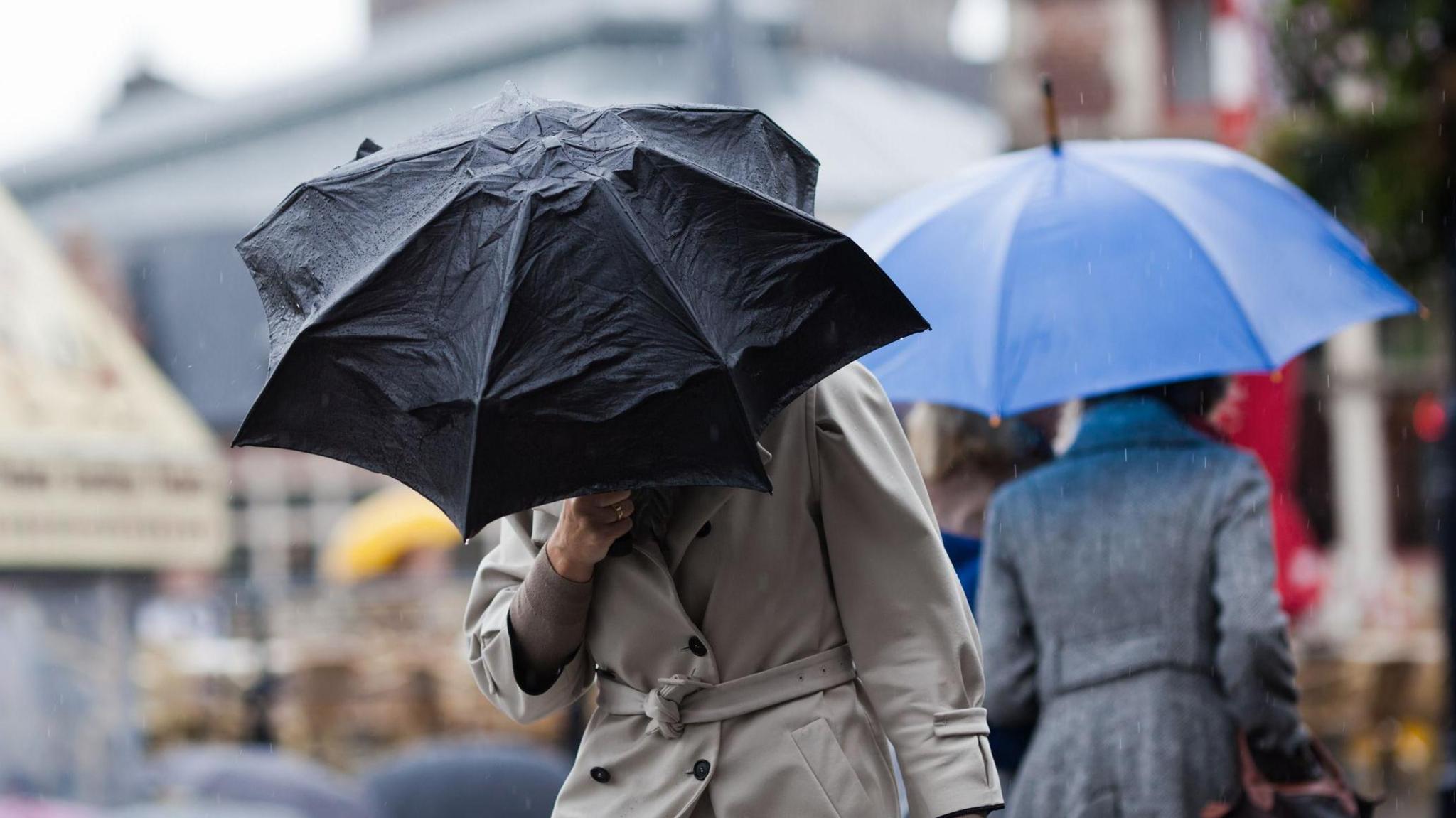 Woman holding umbrella