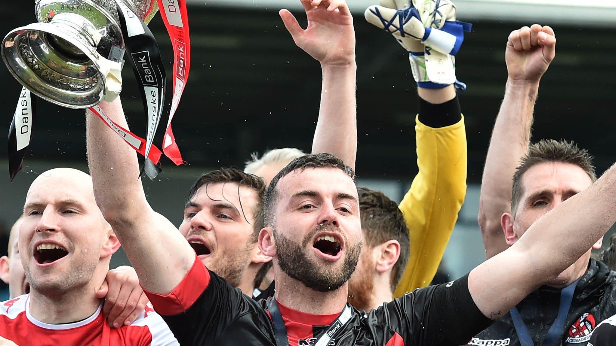 Crusaders sealed the title by beating Ballymena United 2-1