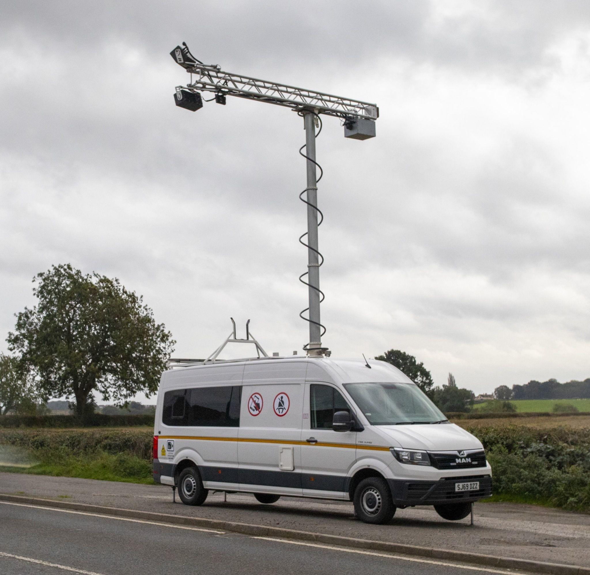 AI technology attached to van by roadside 