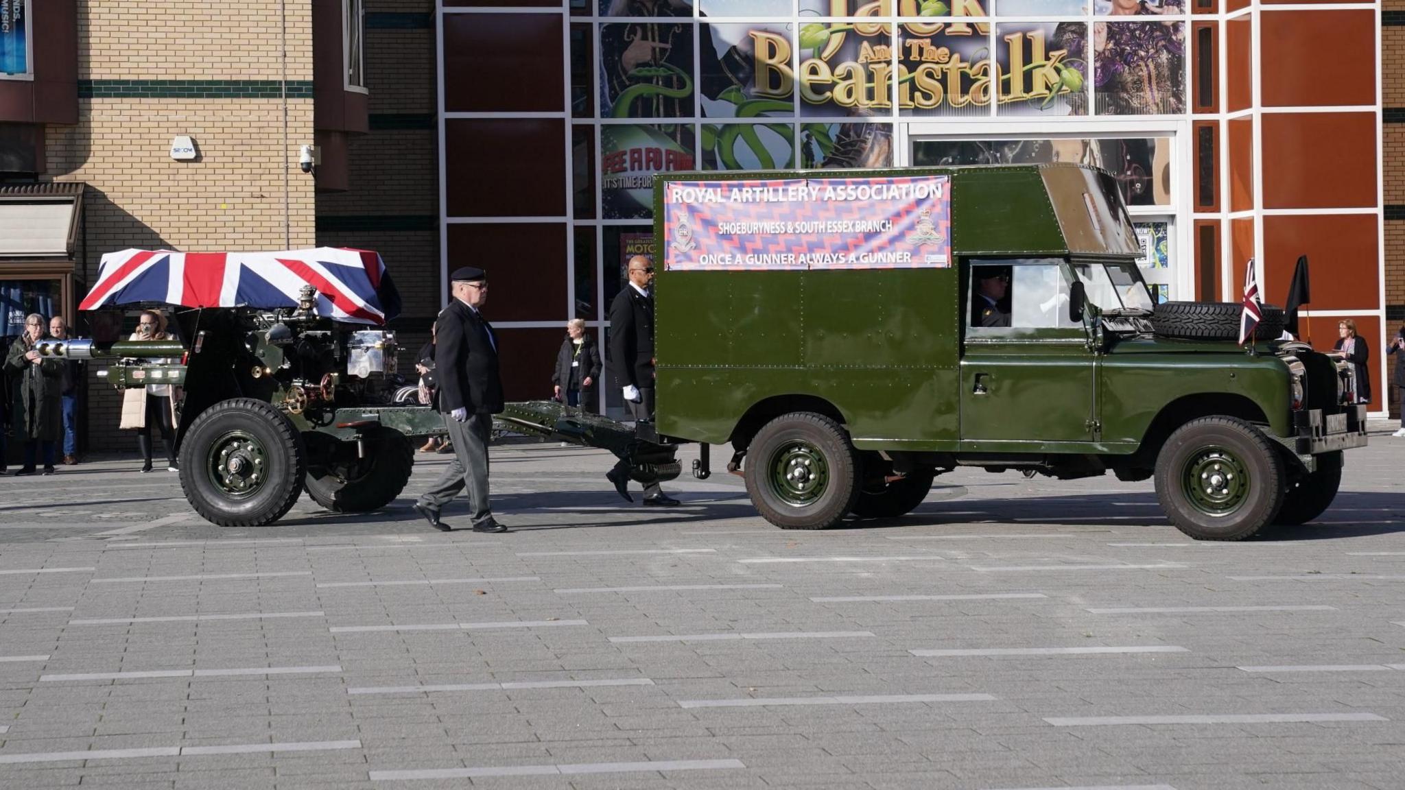 The coffin of 104-year-old D-Day veteran Don Sheppard on a gun carriage arrives outside Martin's Church in Basildon, Essex, ahead of his funeral service.