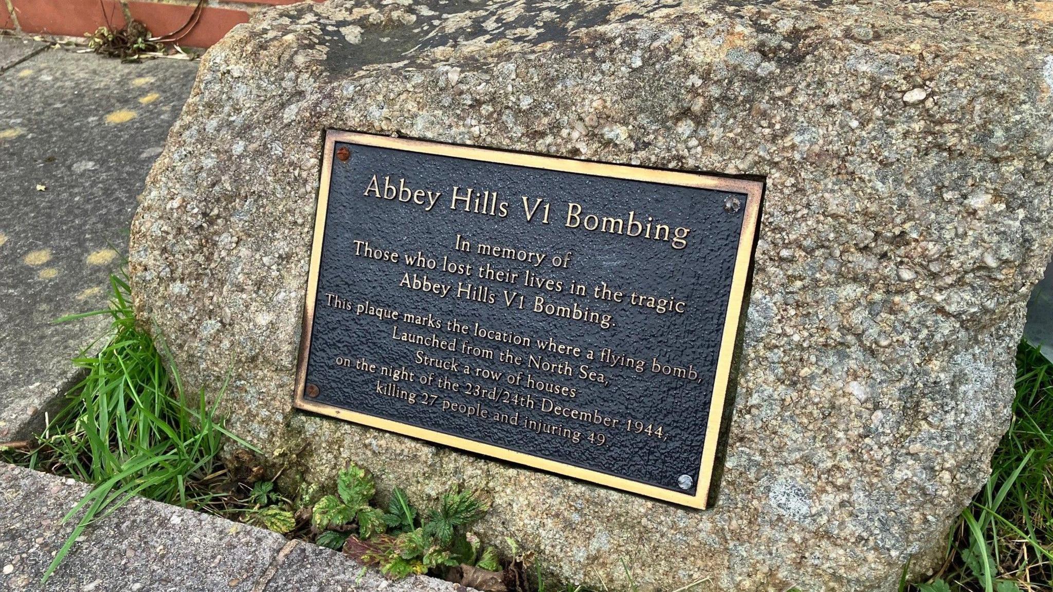 A picture of a plaque on Abbey Hills Road in Oldham - which remembers the site where a V1 rocket killed 27 people.