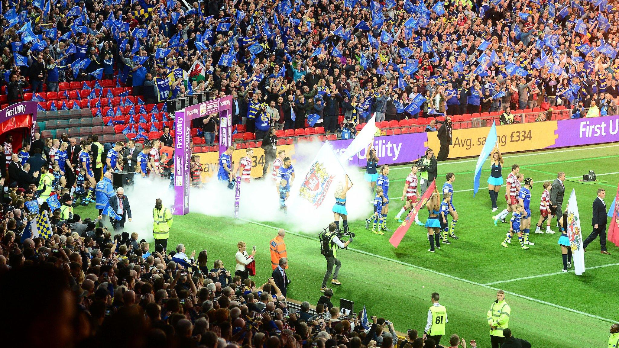 Teams emerge at the Grand Final