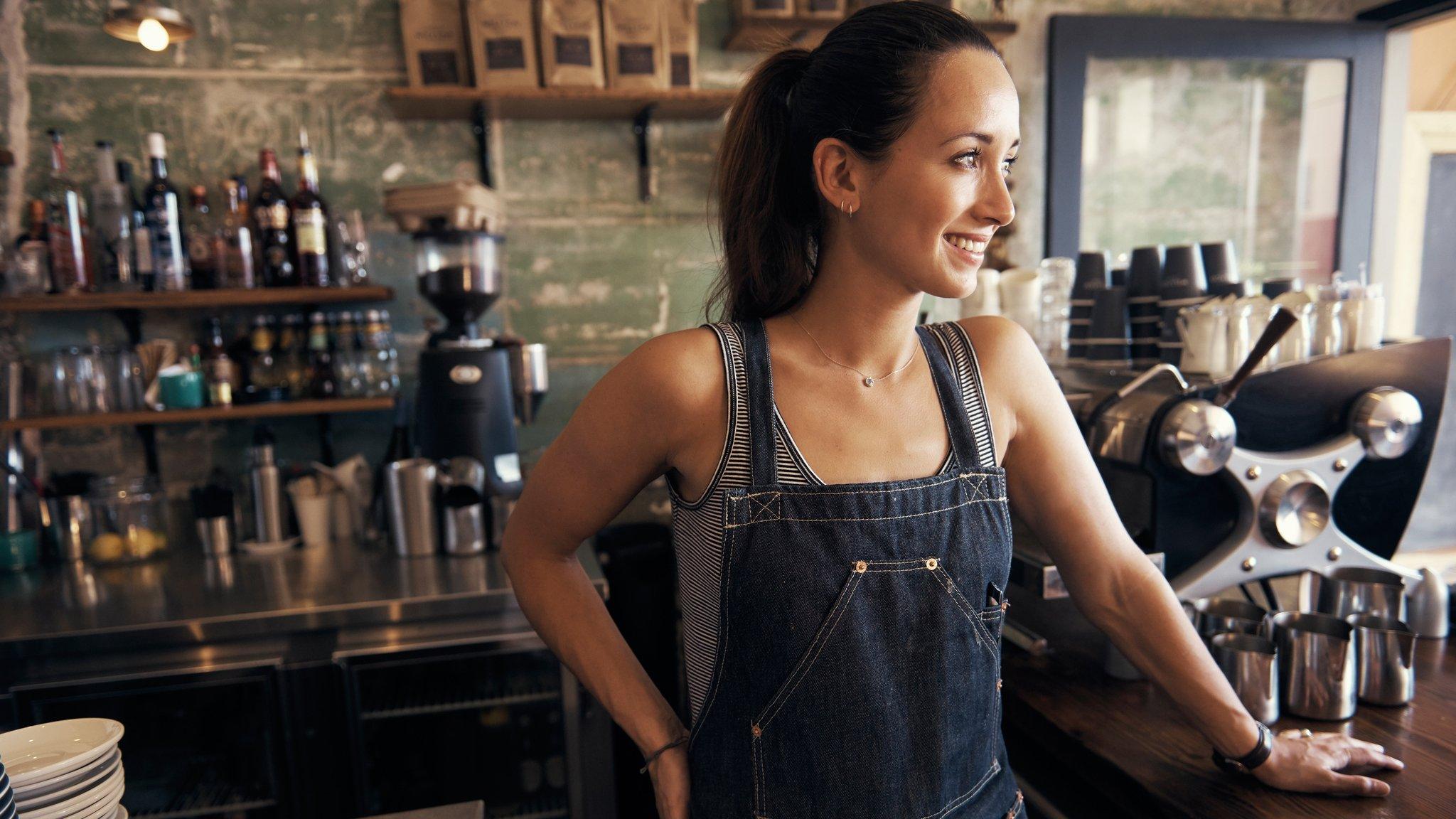 woman running coffee bar