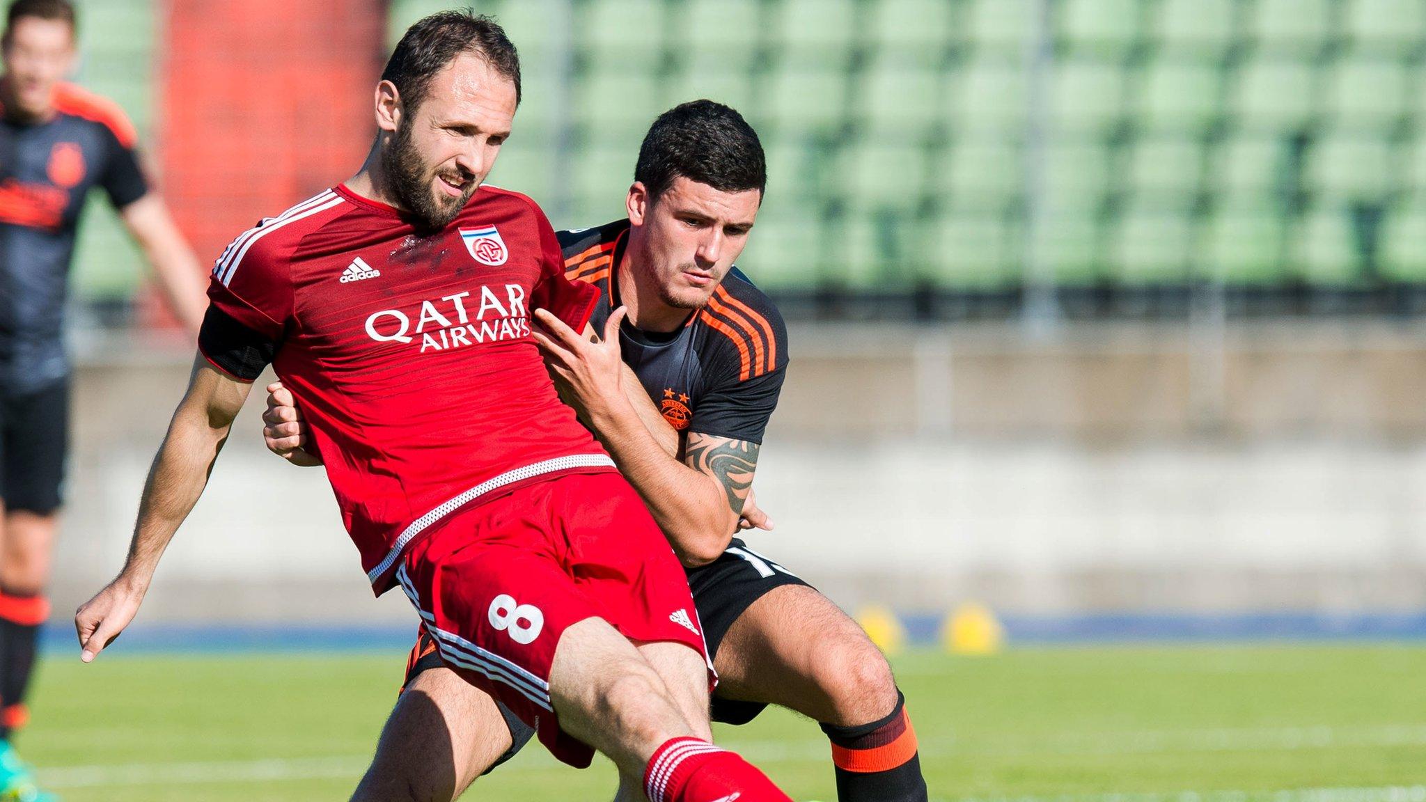 Aberdeen's Anthony O'Connor (behind) and CS Fola Esch's Muharemovic Veldin