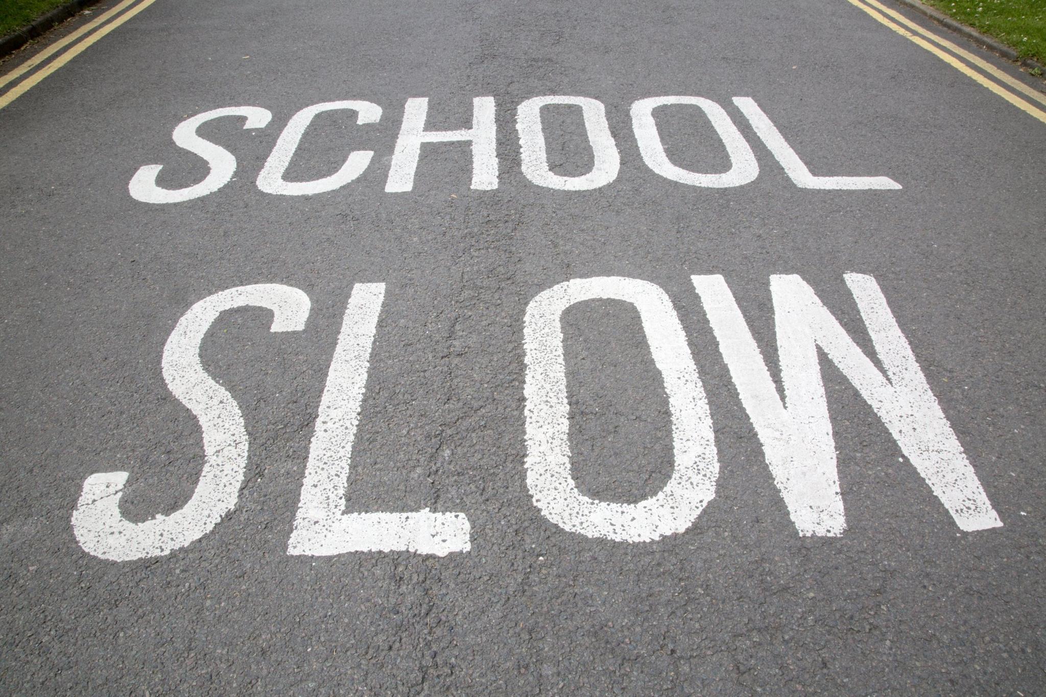 School slow markings on a road.