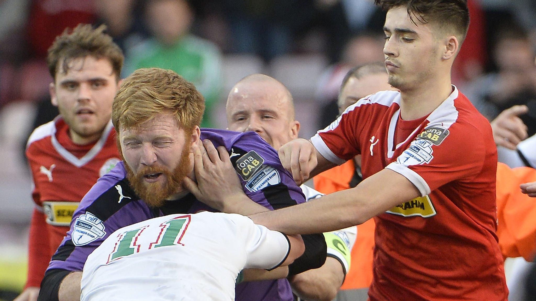 Cliftonville goalkeeper and Glentoran's Chris Lavery were sent-off for fighting