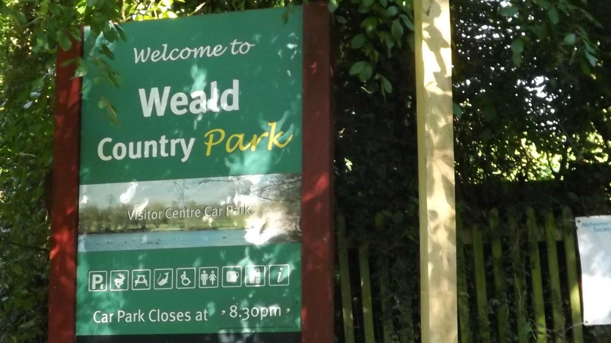 'Welcome to Weald Country Park' sign