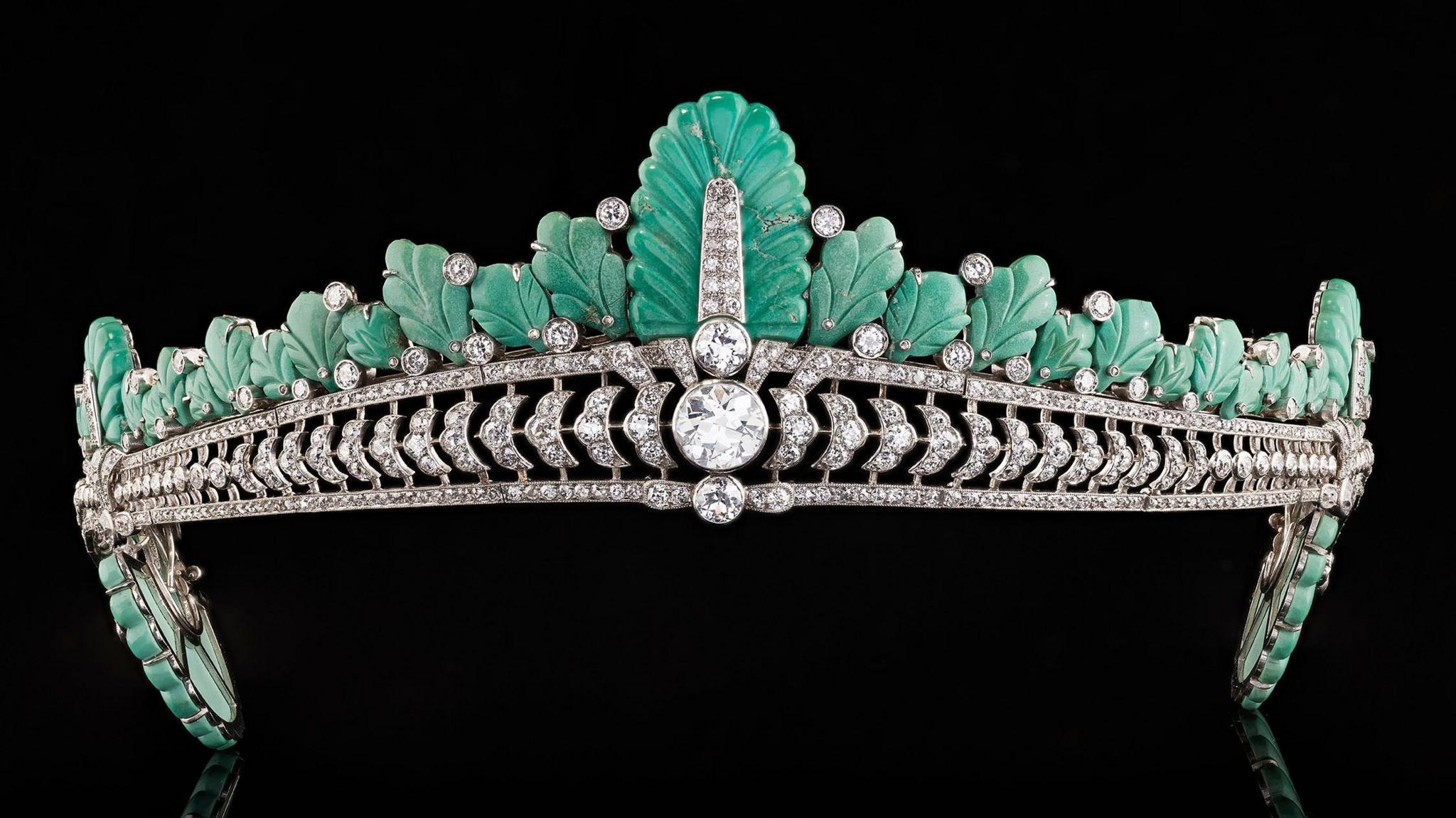 The tiara from the front showing the turquoise plumage and large diamond at the centre.