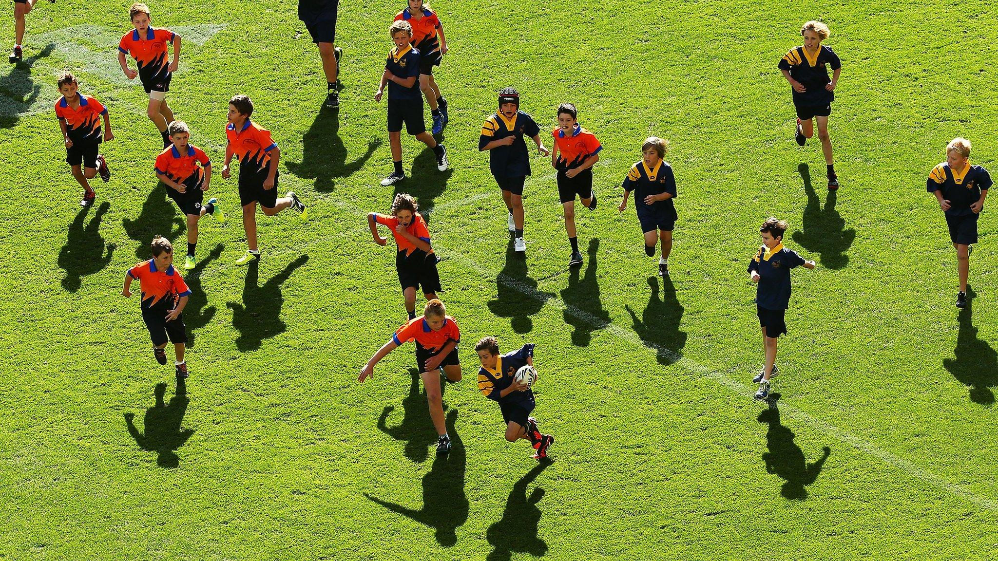 Children playing rugby