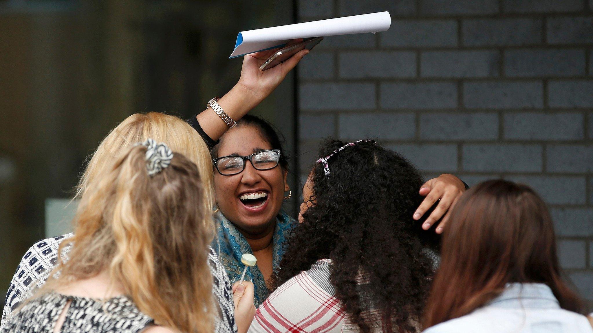 A-level students celebrate at Winstanley College in Wigan