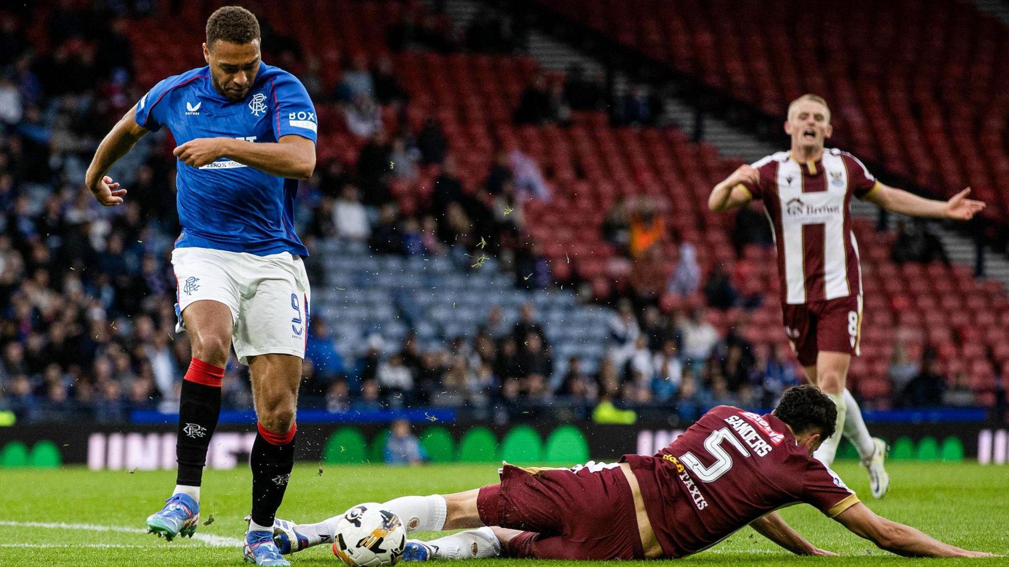 Rangers striker Cyriel Dessers and St Johnstone defender Jack Sanders