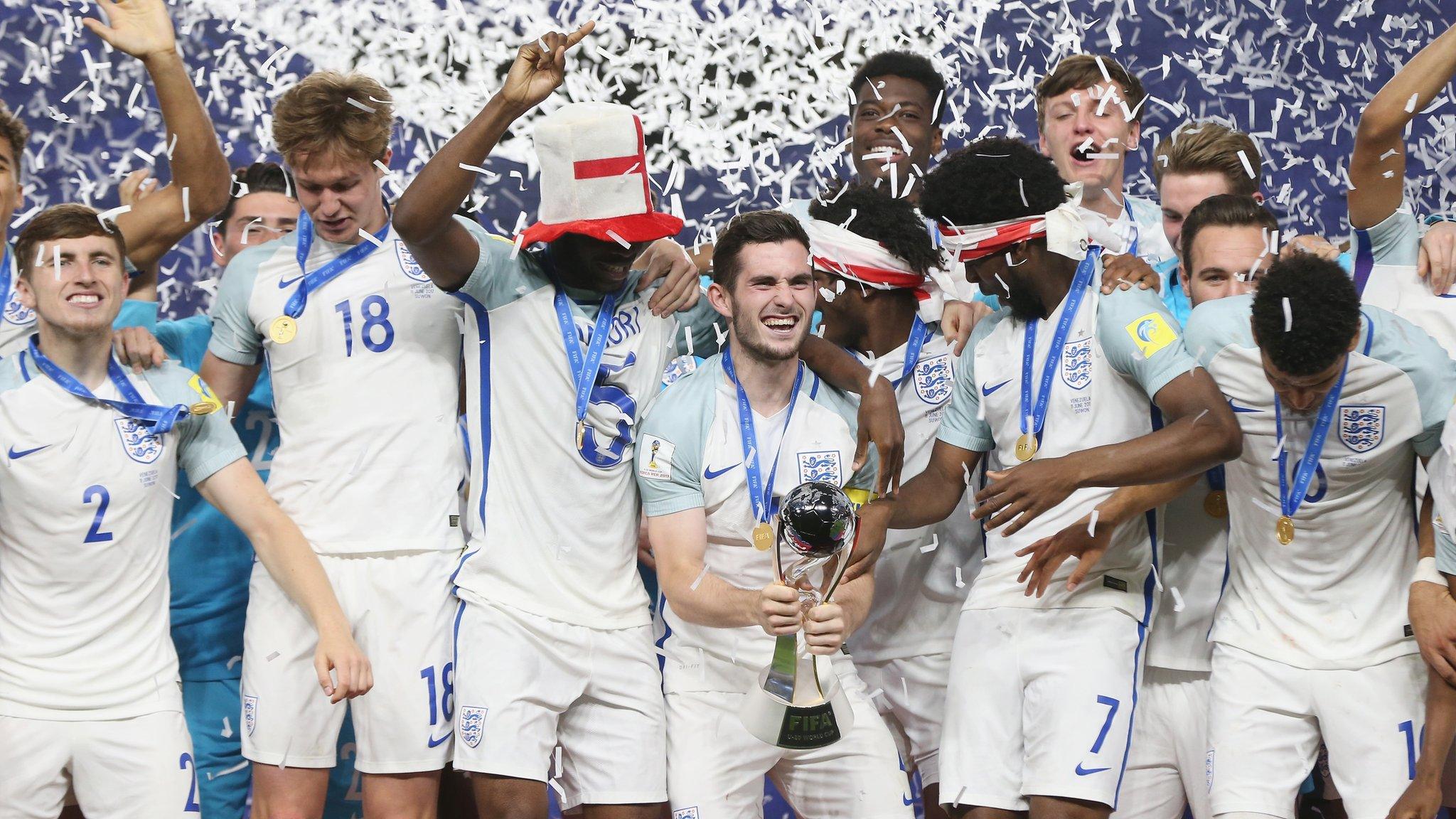 England captain Lewis Cook lifts the U20 World Cup trophy in South Korea