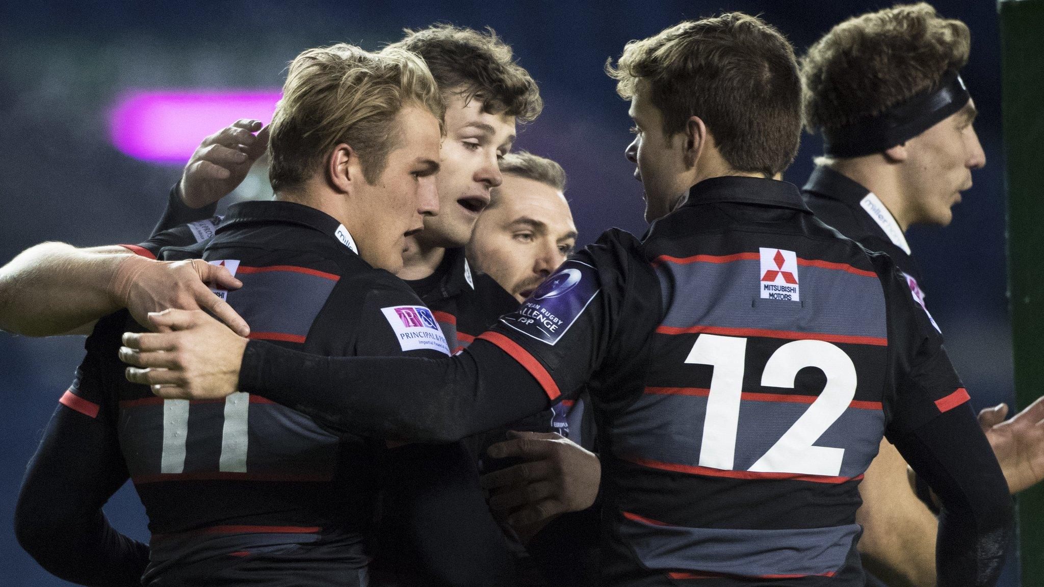 Edinburgh players celebrate Duhan van der Merwe's opening try