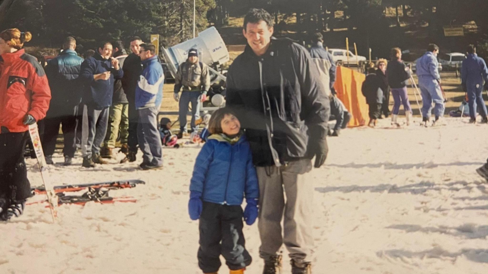 Mariona Caldentey and her father skiing