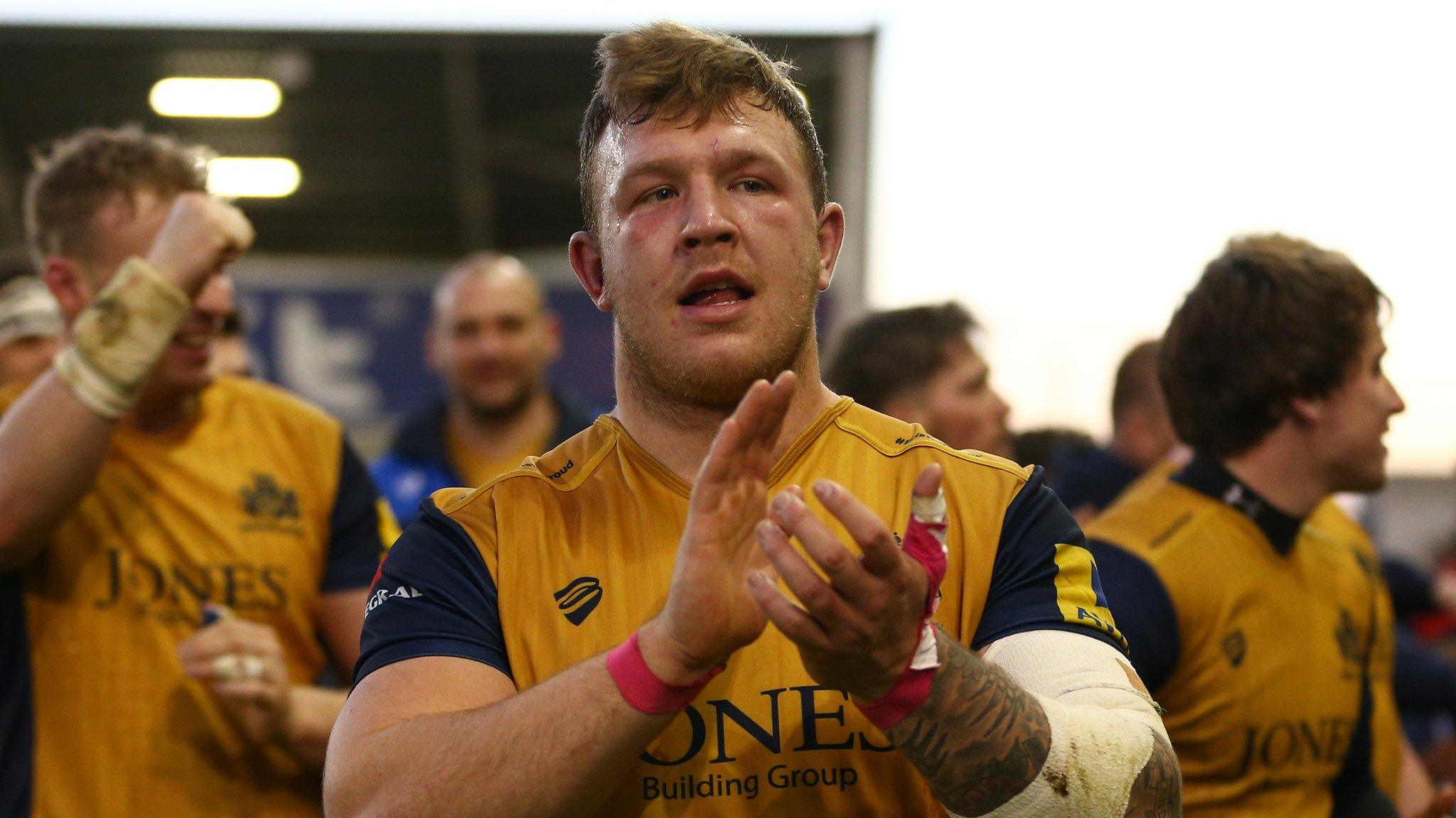 Max Crumpton applauds the Bristol Rugby fans following his side's Premiership victory at Sale in January 2017