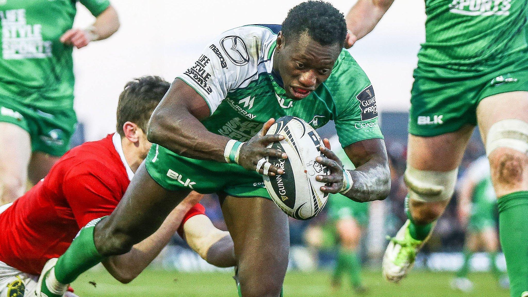 Niki Adeolokun dives over the line for his second try of the game