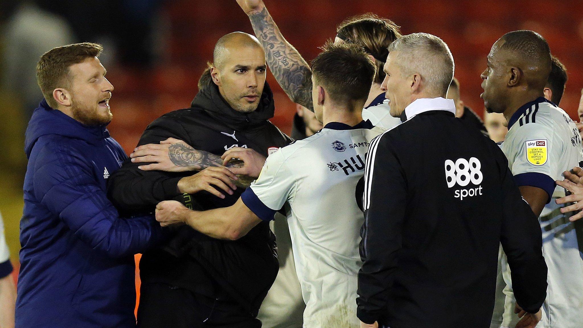Cardiff and Barnsley players and staff clash