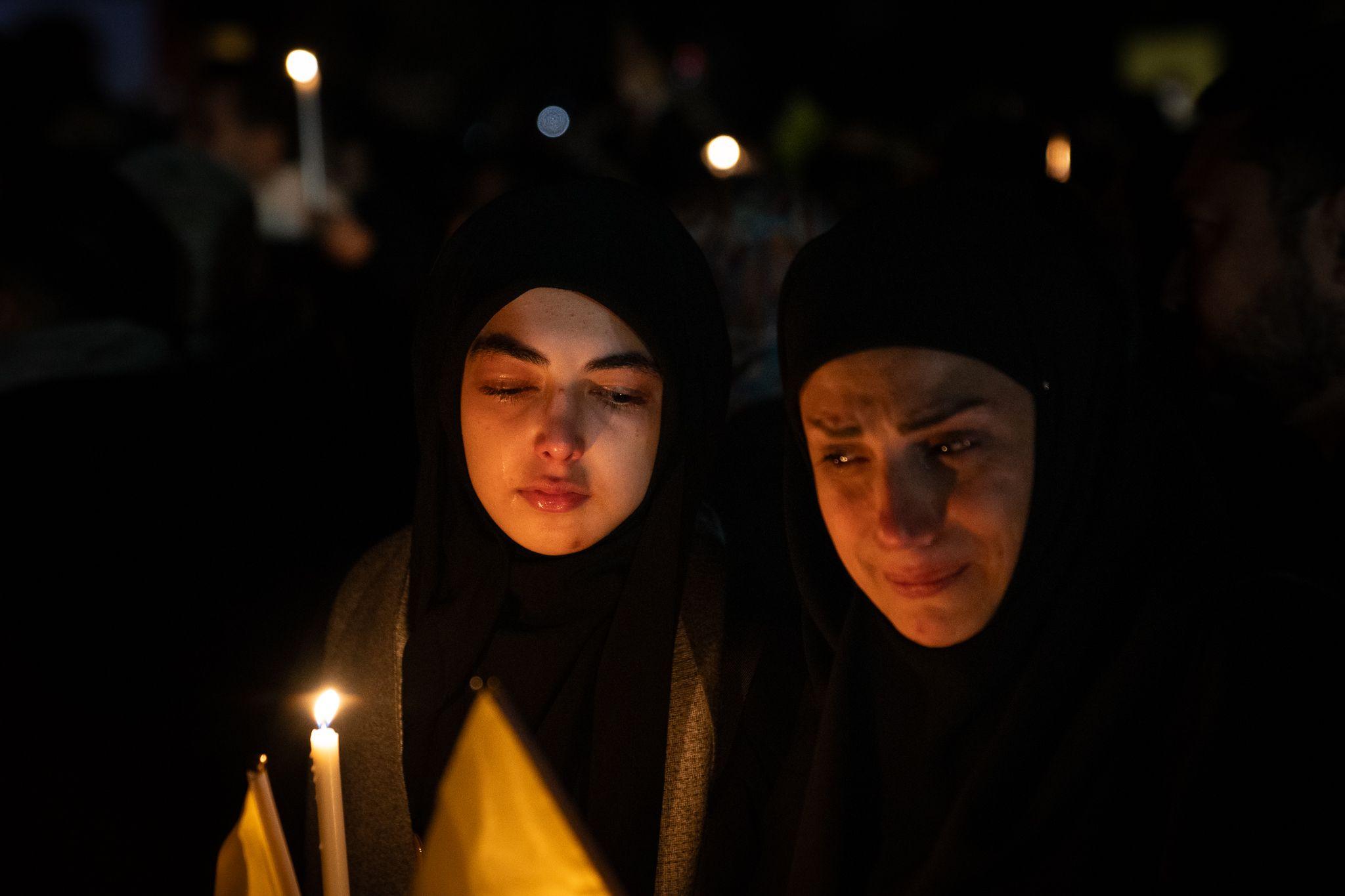 People wept and held candles and pictures of Nasrallah, while speeches by the former Hezbollah leader played from a sound system.