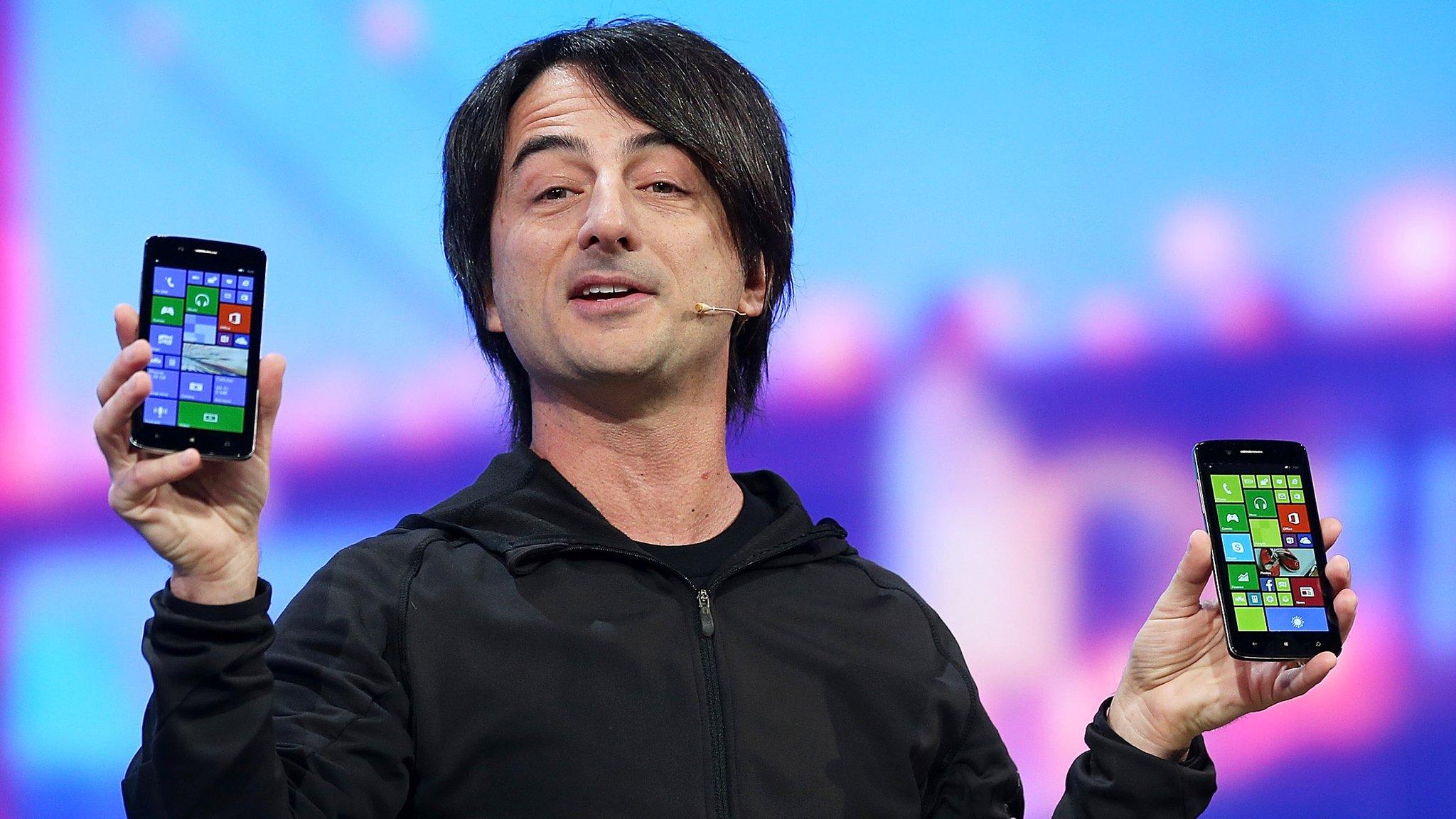 Joe Belfiore holding Windows phones