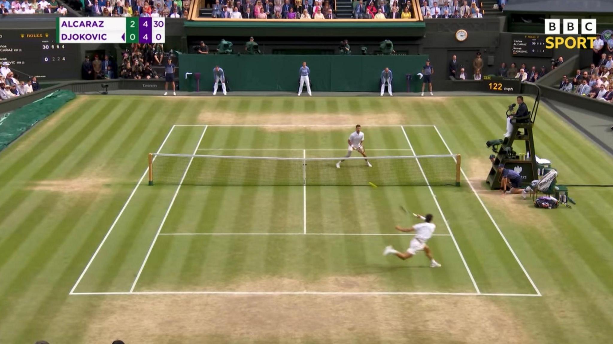 Alcaraz sending a shot past Djokovic