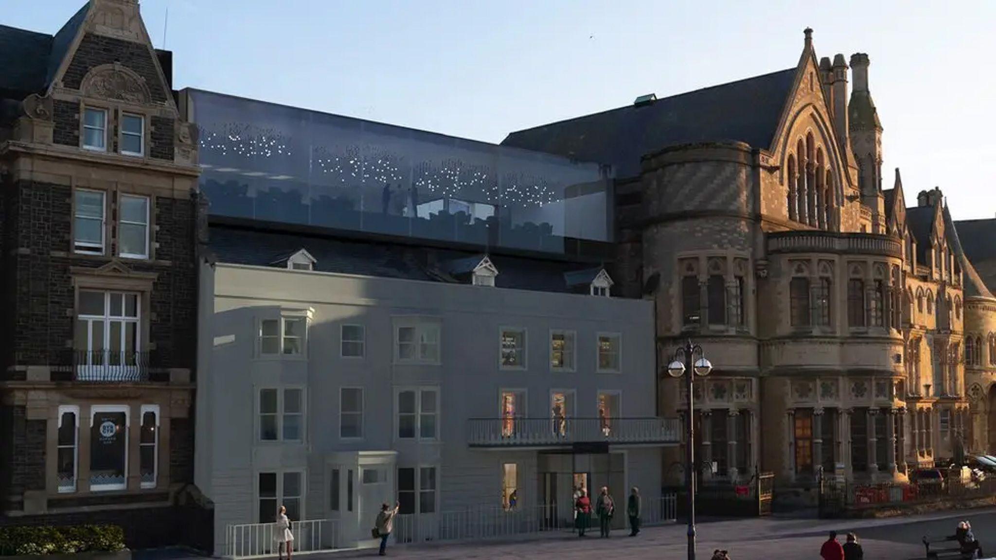 An artist's impression of the renovations showing an atrium between two older parts of the building.