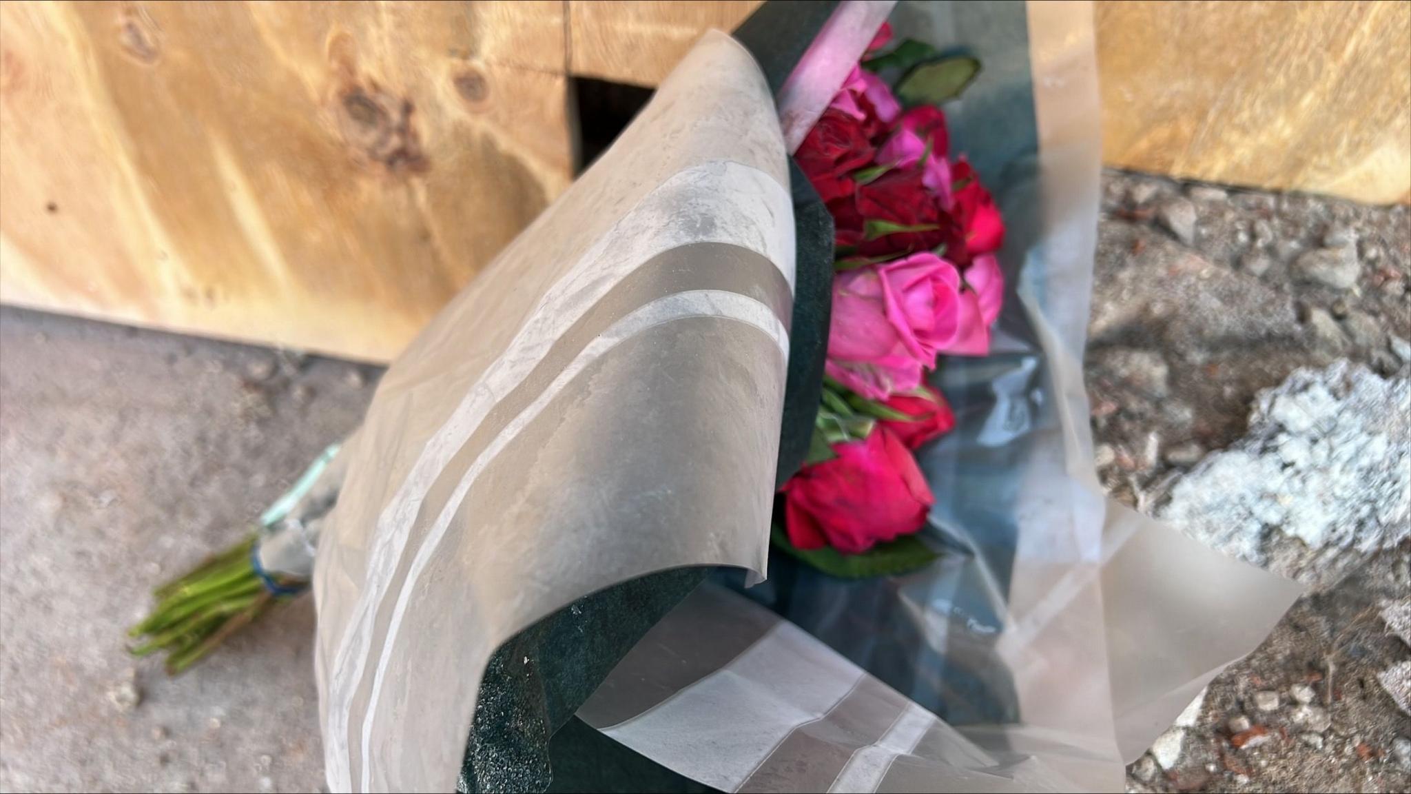 A bouquet of flowers left at the scene of the crash
