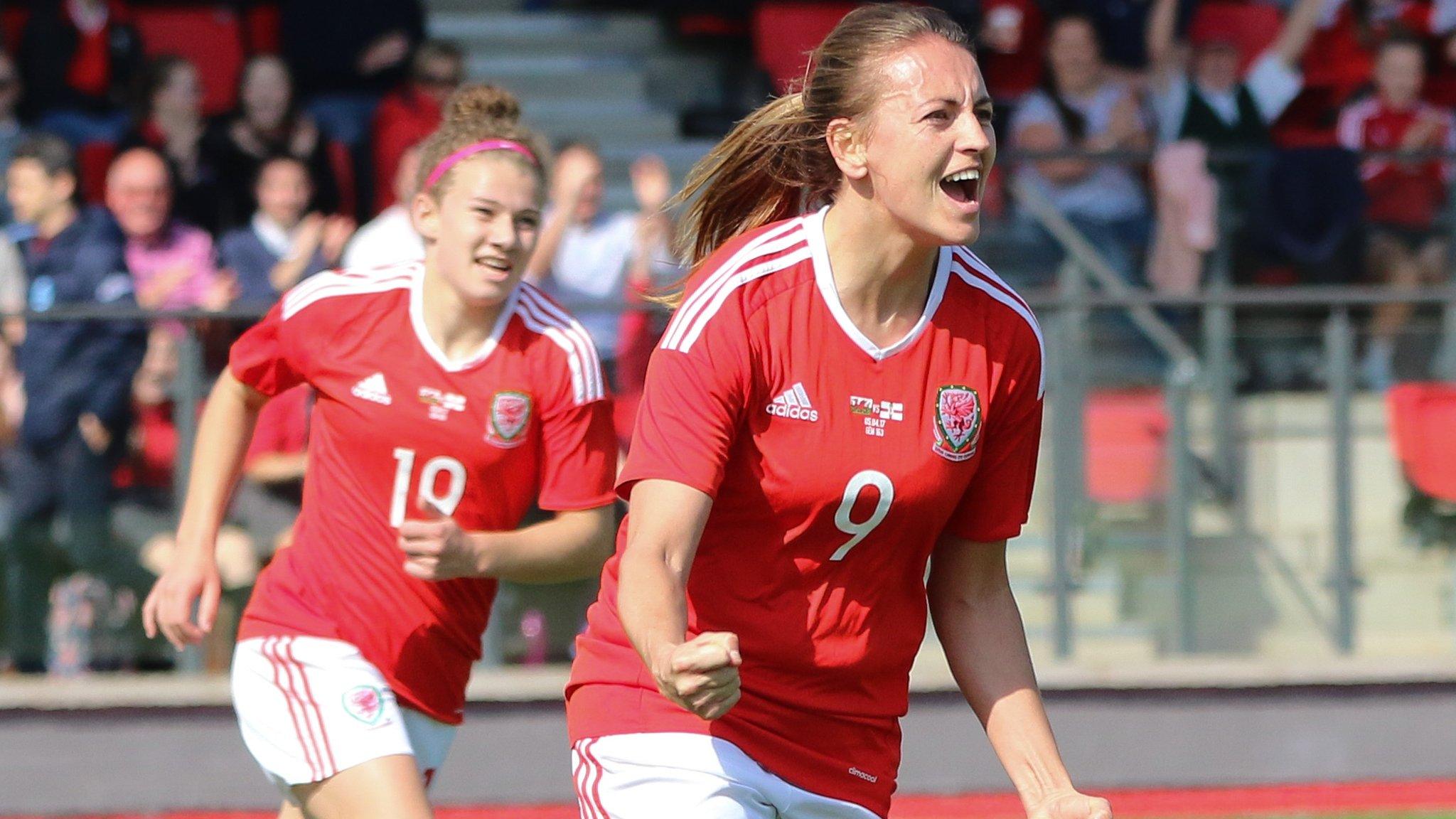 Kayleigh Green celebrates after scoring for Wales