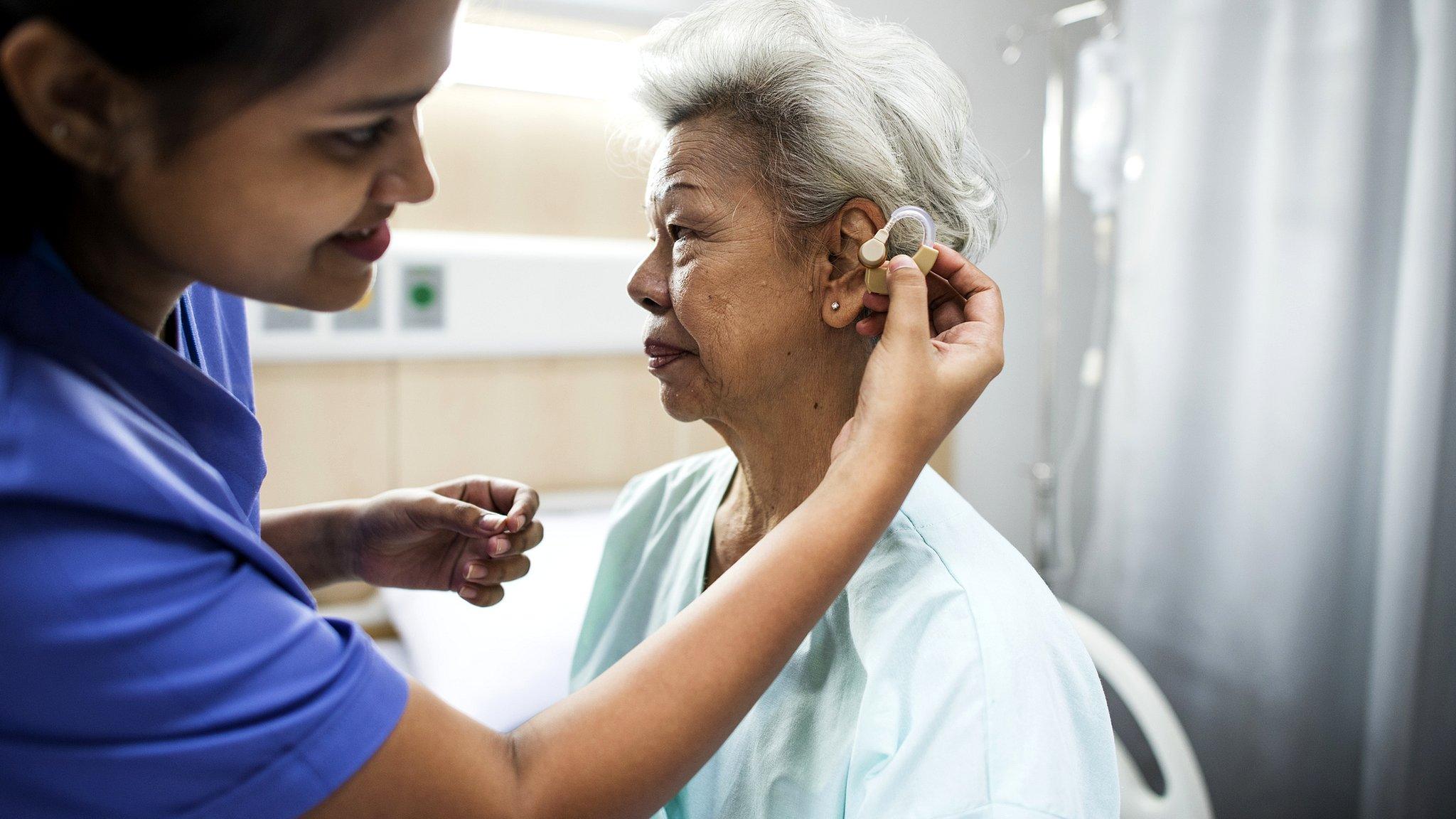 Nurse helping a patient