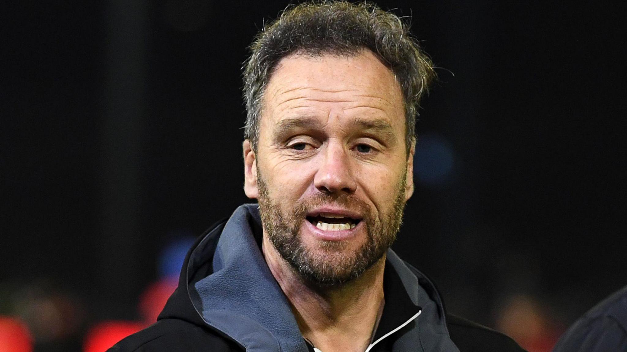 Former Wales wing Mark Jones, who took over as Ospreys head coach from Toby Booth in December 2024, speaks to his players