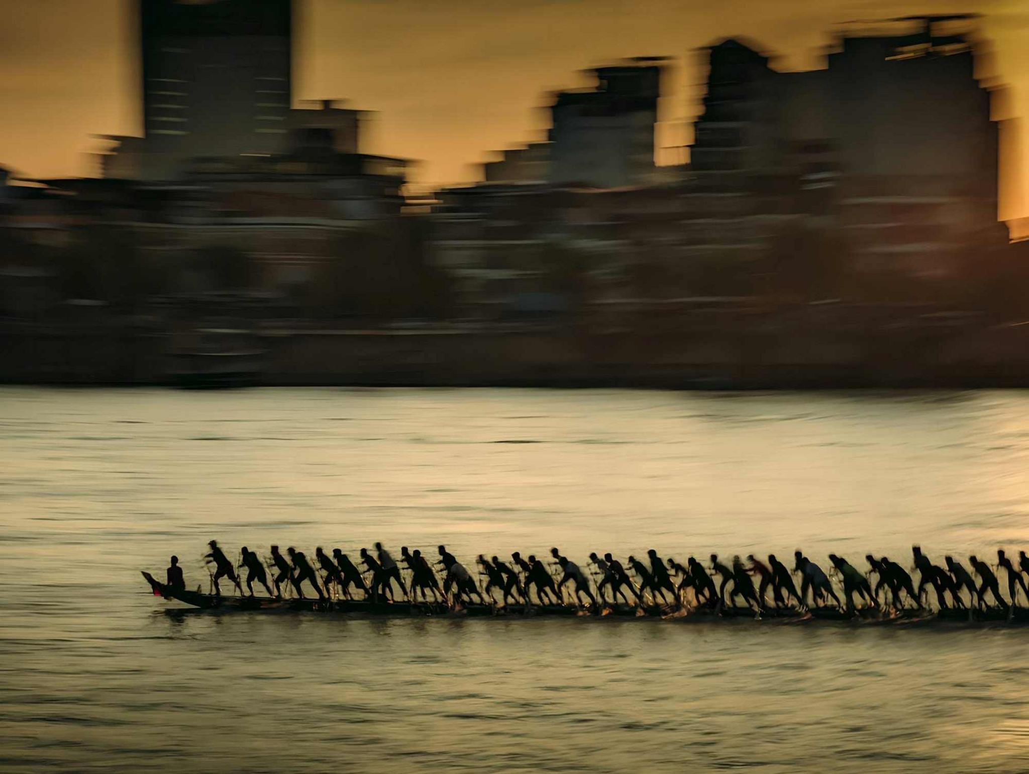 Competitors practise for Bon Om Touk, a traditional festival that is also known as the Cambodian Water Festival.