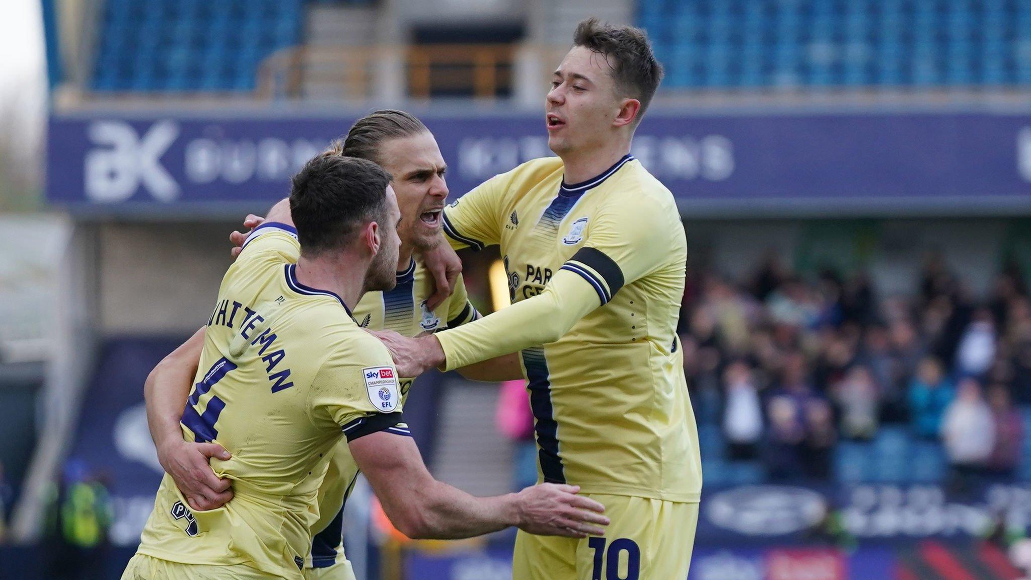 Preston celebrate their equaliser at Millwall