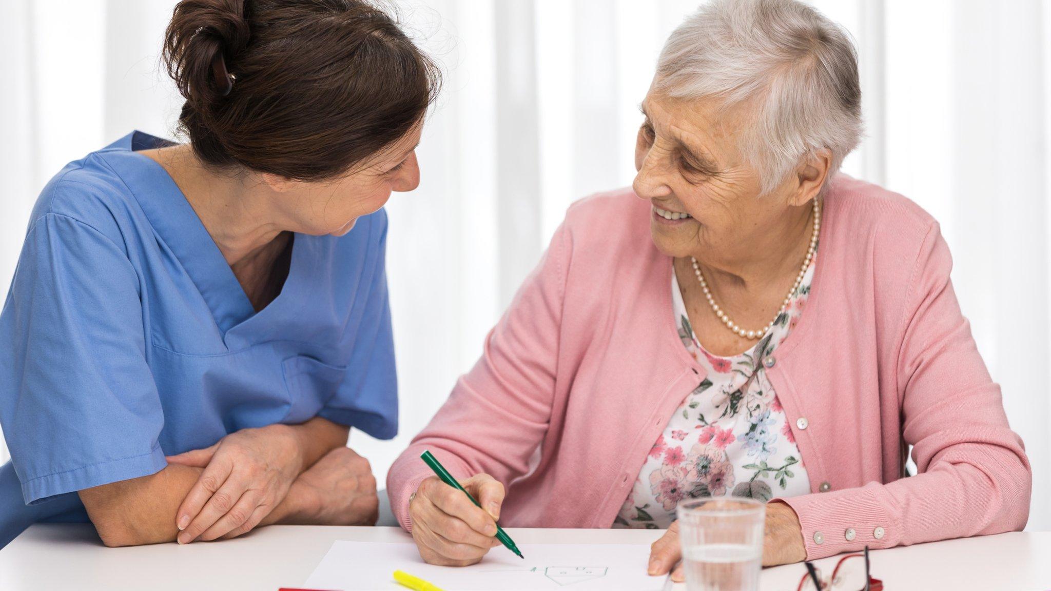 Caregiver with elderly woman