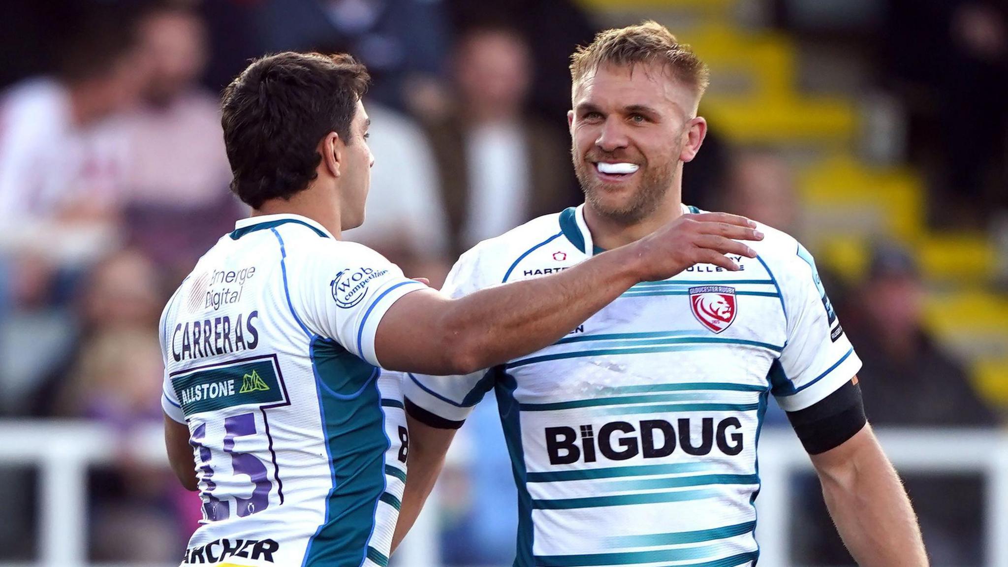Chris Harris (right) celebrates a try with team-mate Santiago Carreras