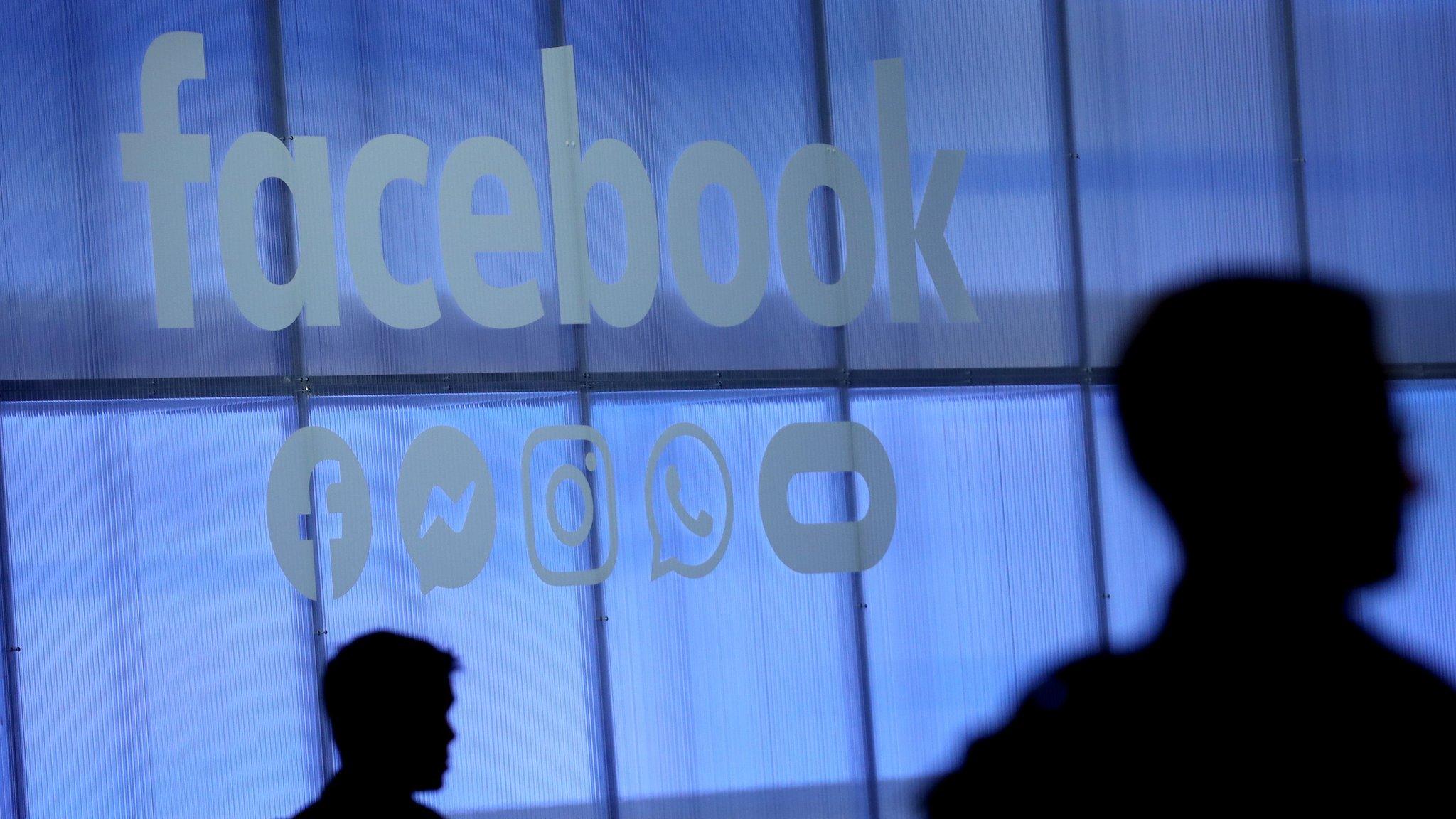 The Facebook logo is displayed during the F8 Facebook Developers conference in San Jose, California in April 2019