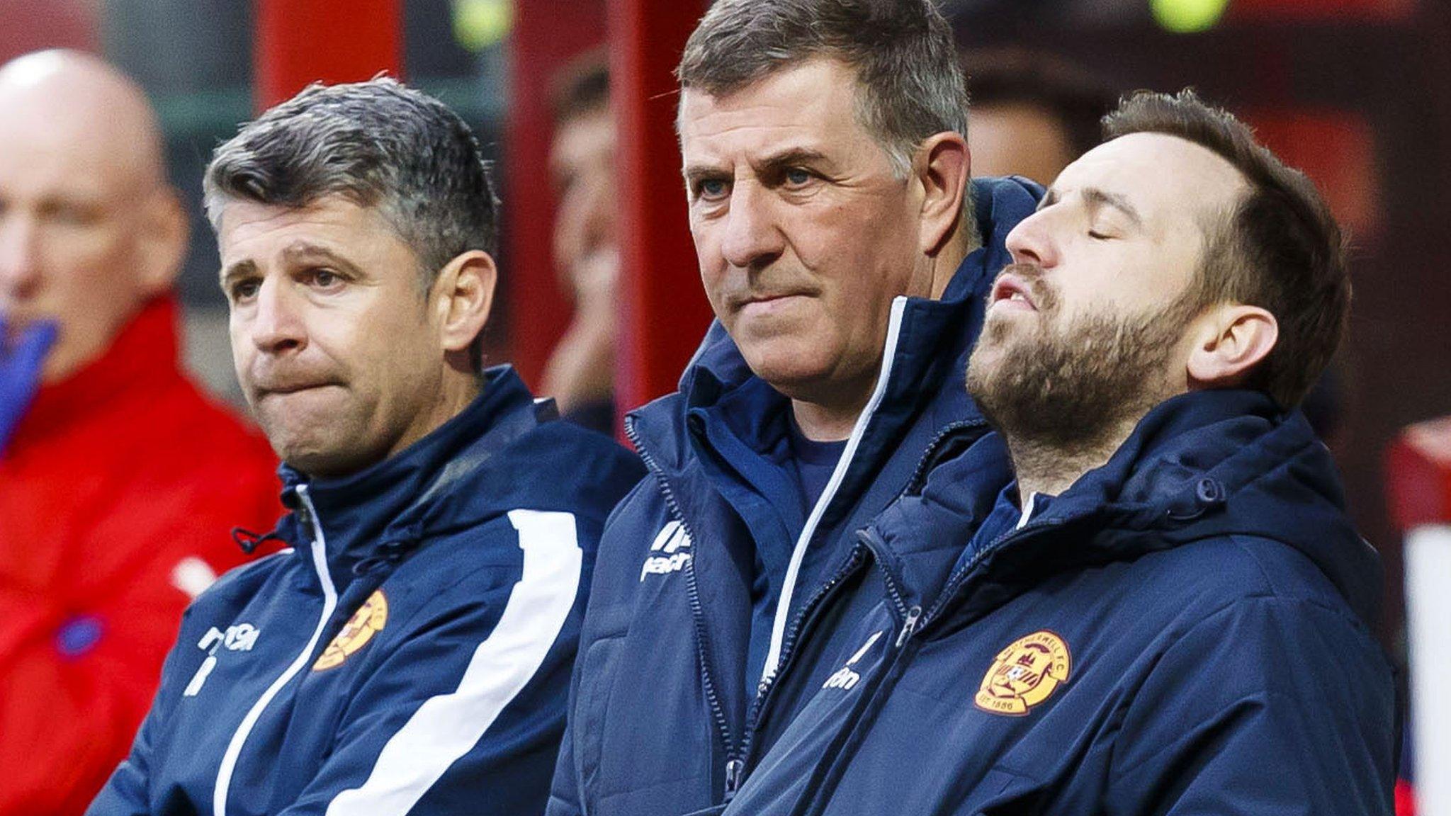 Motherwell's management team look on as Dundee run riot