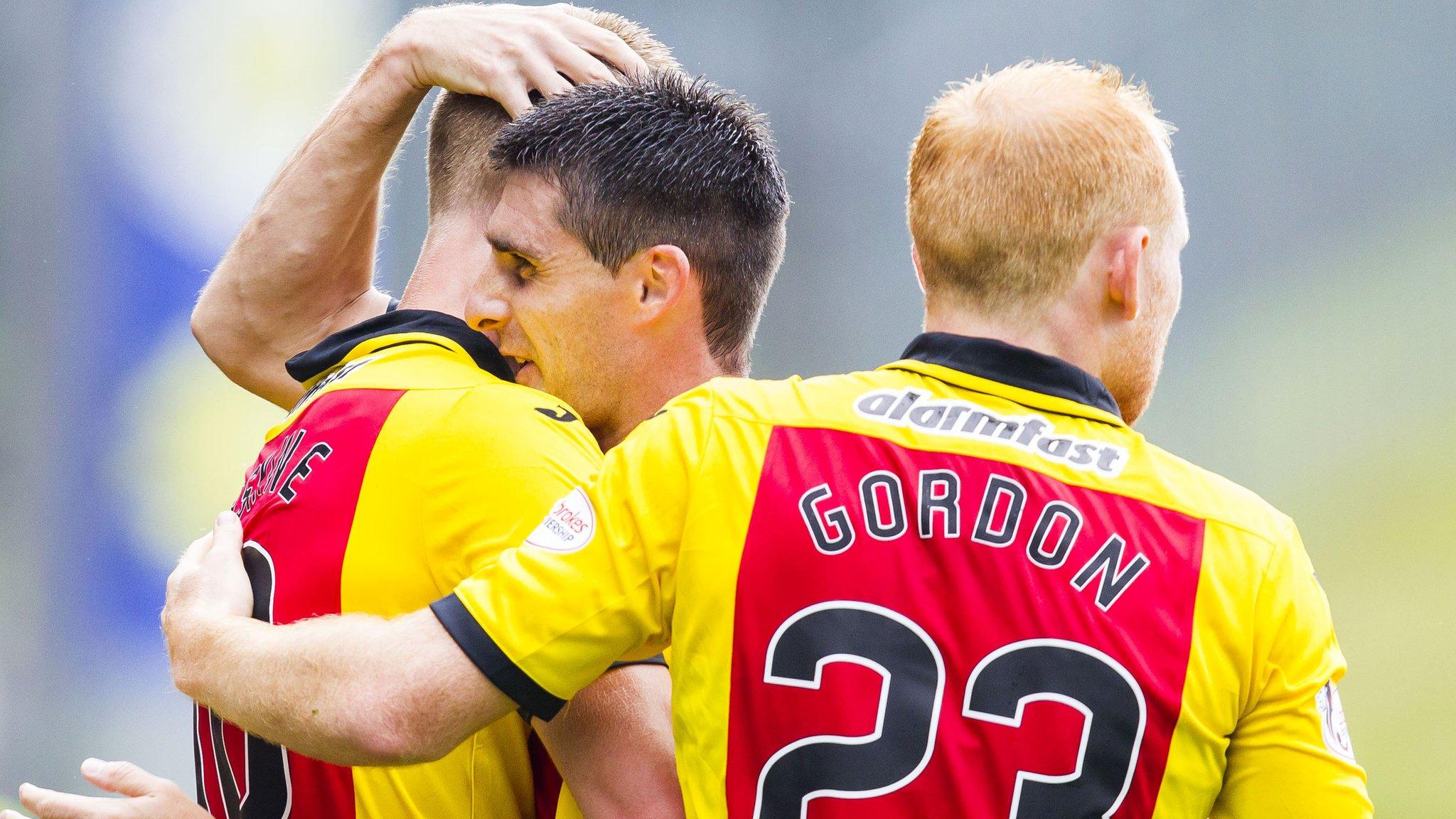 Partick's Kris Doolan (centre) congratulates Chris Erskine on his goal