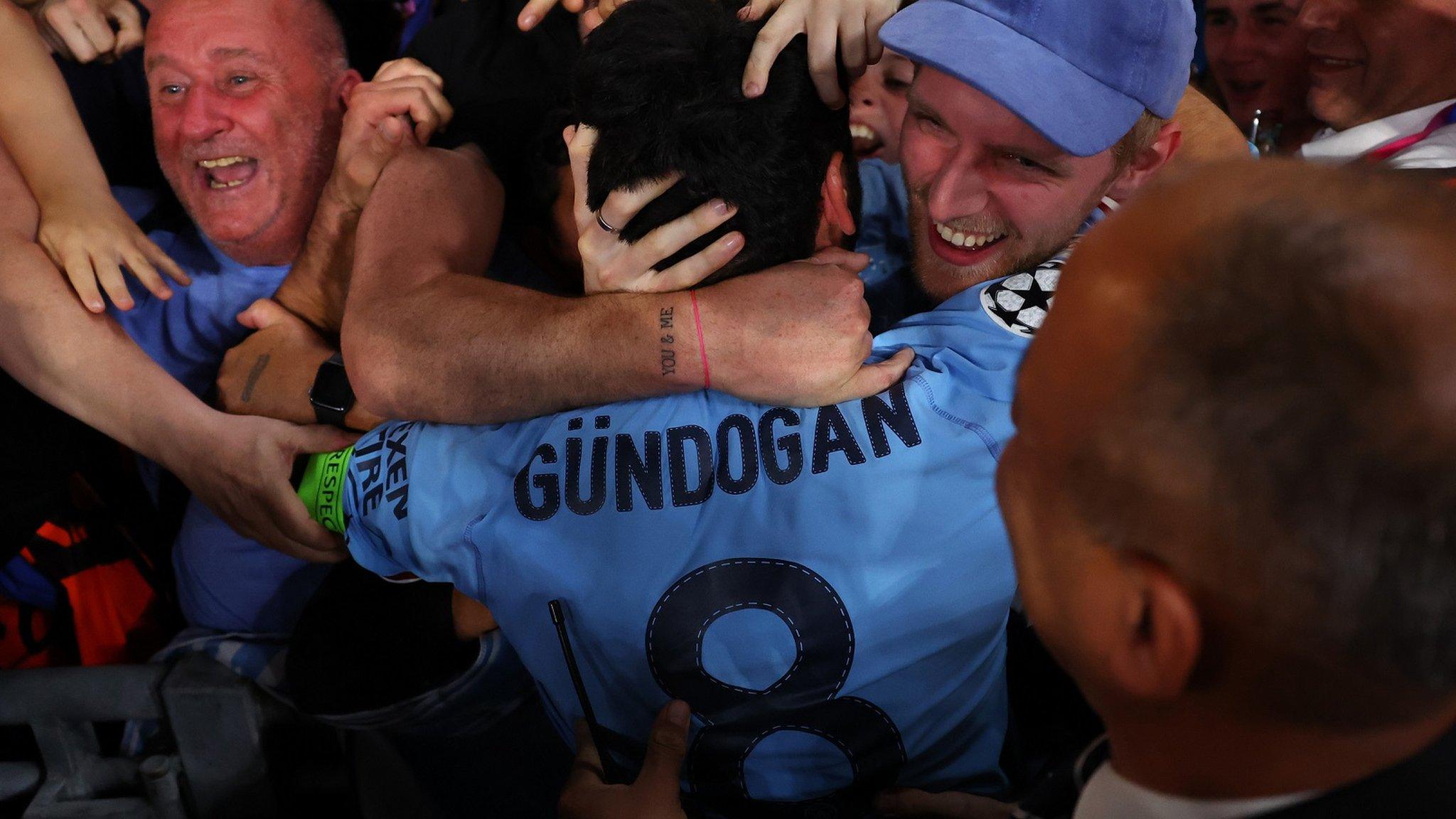 Gundogan celebrates with the fans