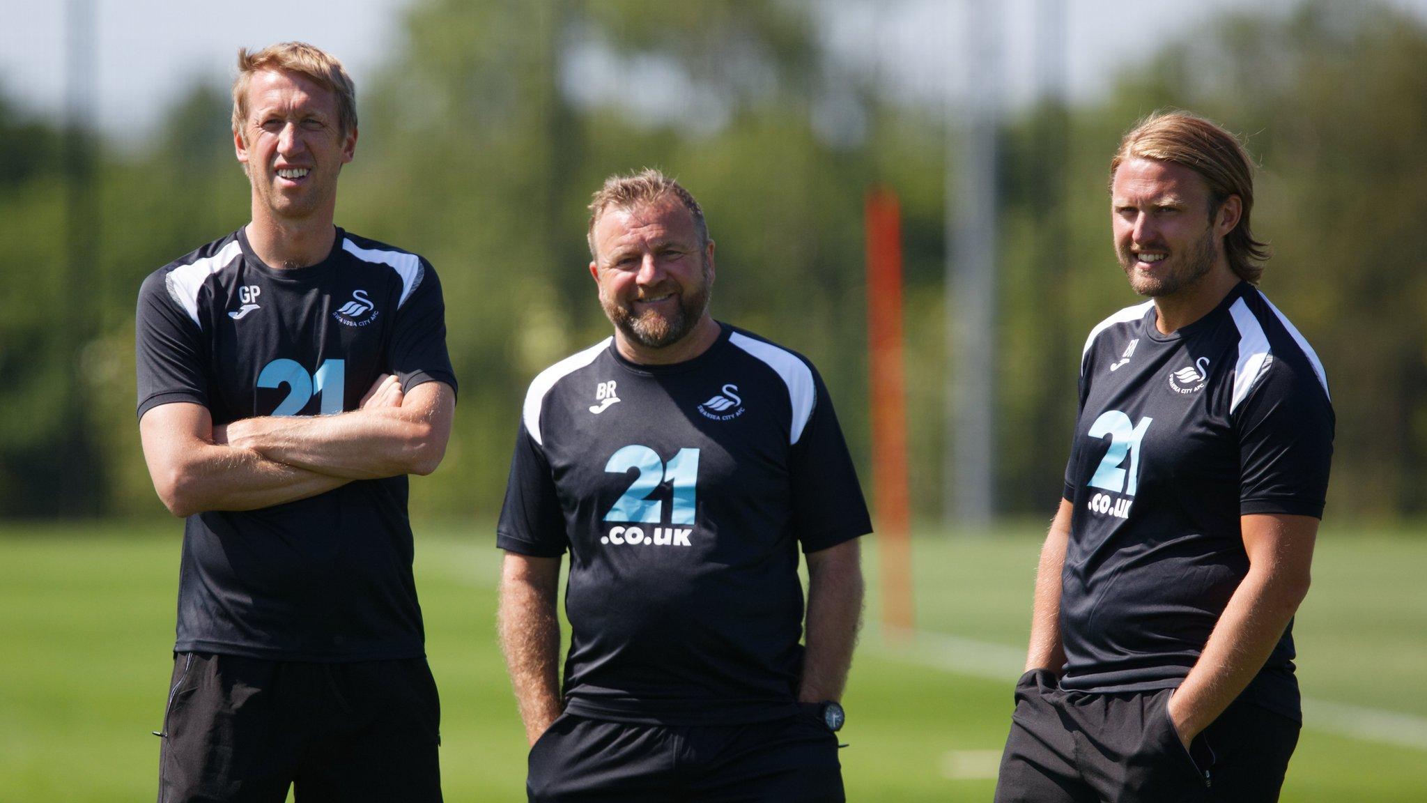 Graham Potter, Bjorn Hamberg, assistant coach and Billy Reid, assistant manager