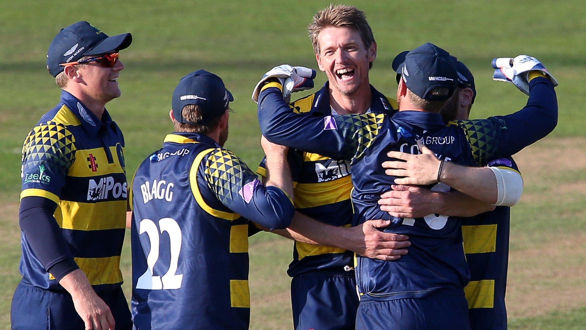 Michael Hogan and Glamorgan team-mates celebrate victory over Essex