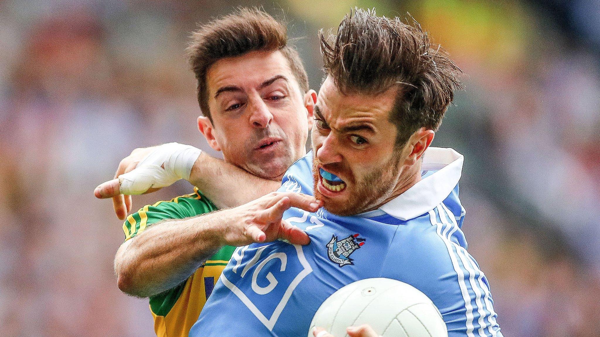 Kerry's Aidan O'Mahony tackles Dublin's Michael Darragh Macauley