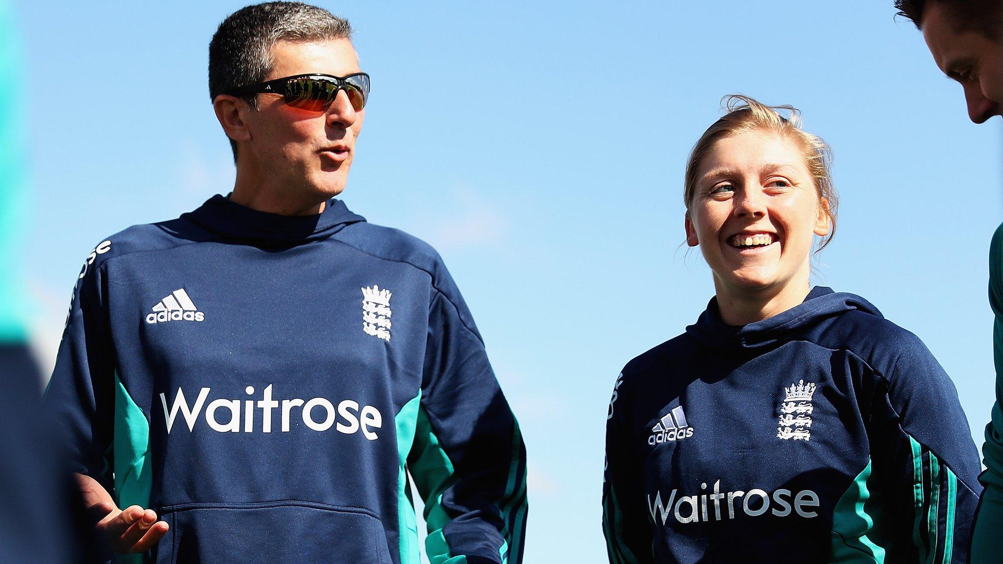 Mark Robinson talks to his England team