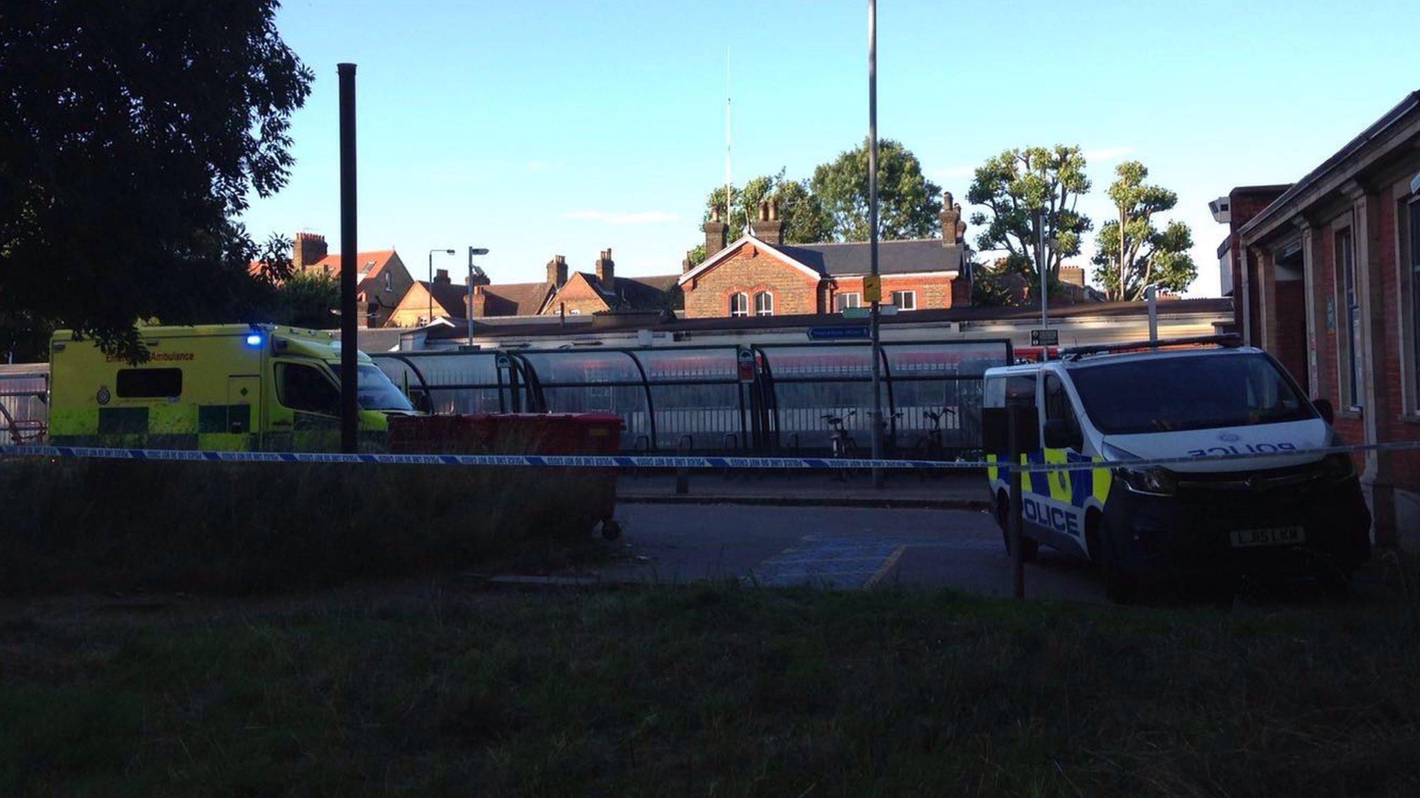 An ambulance and a police van at Wandsworth Common train station