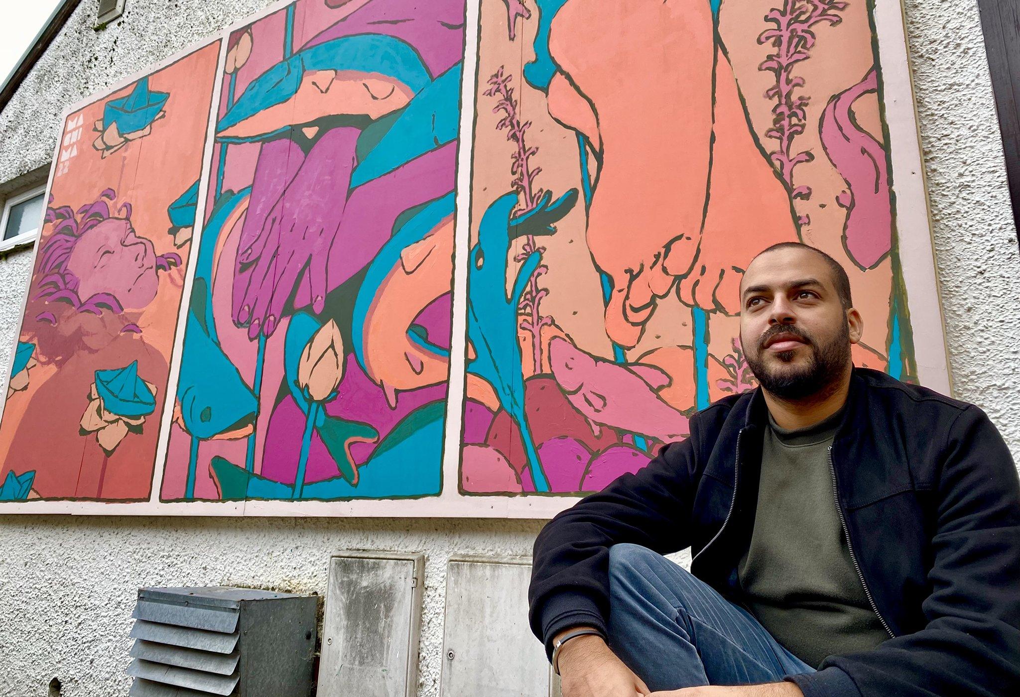 Artist Mehdi Annassi by Lake District boat club, overlooking Windermere