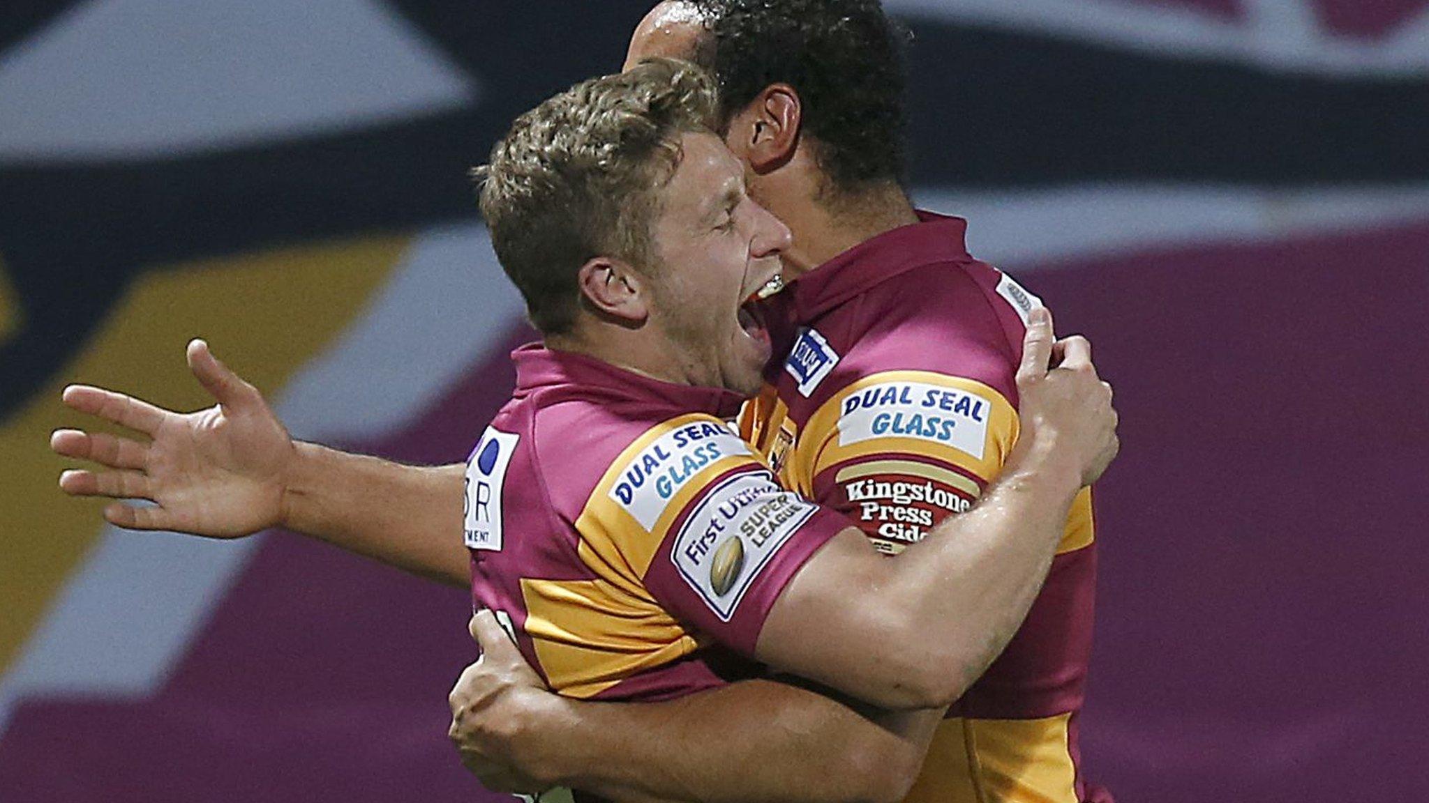 Kyle Wood celebrates his try with Leroy Cudjoe